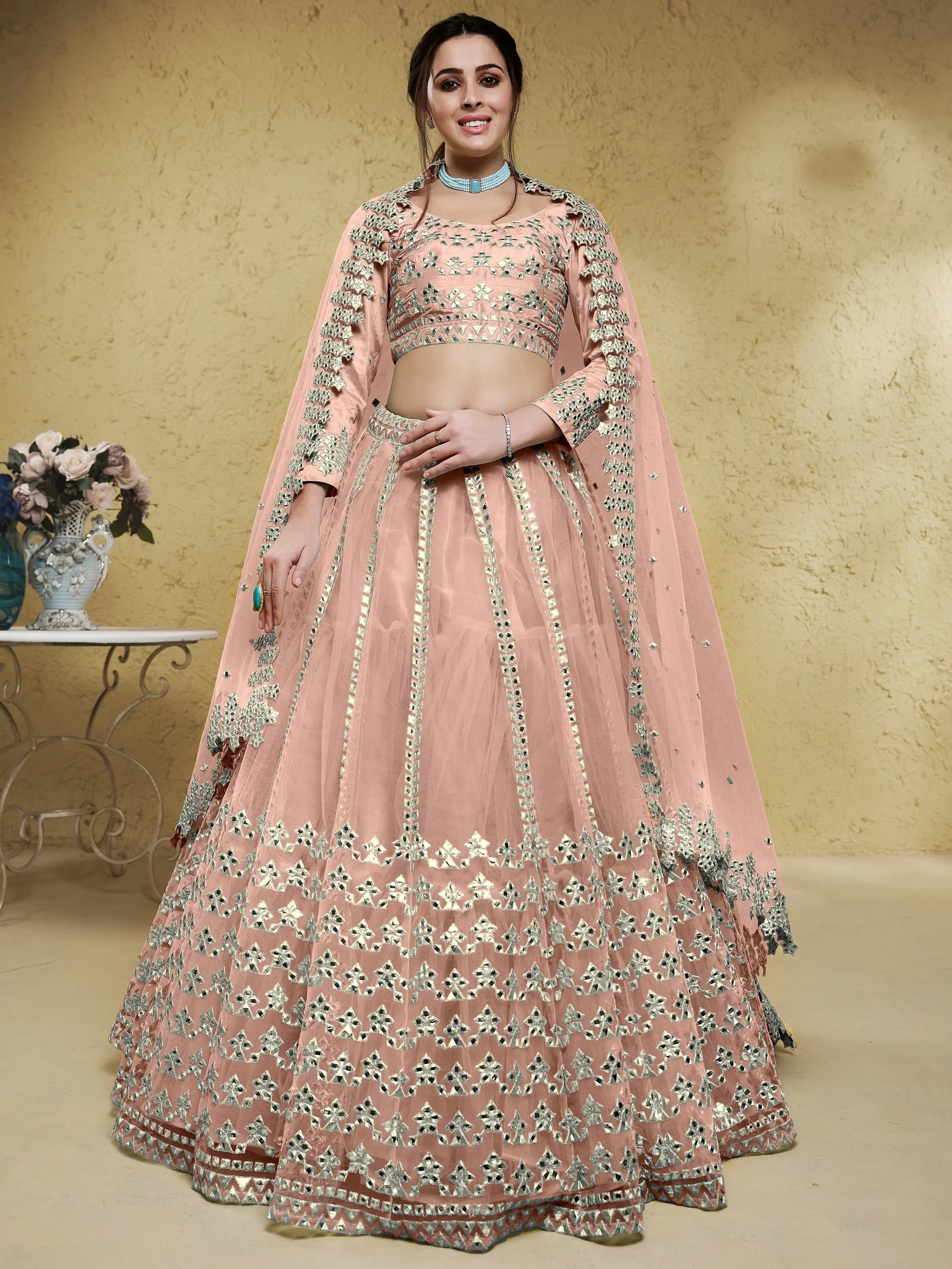 Pink Stunning Foil Work Net Wedding Lehenga Choli With Dupatta