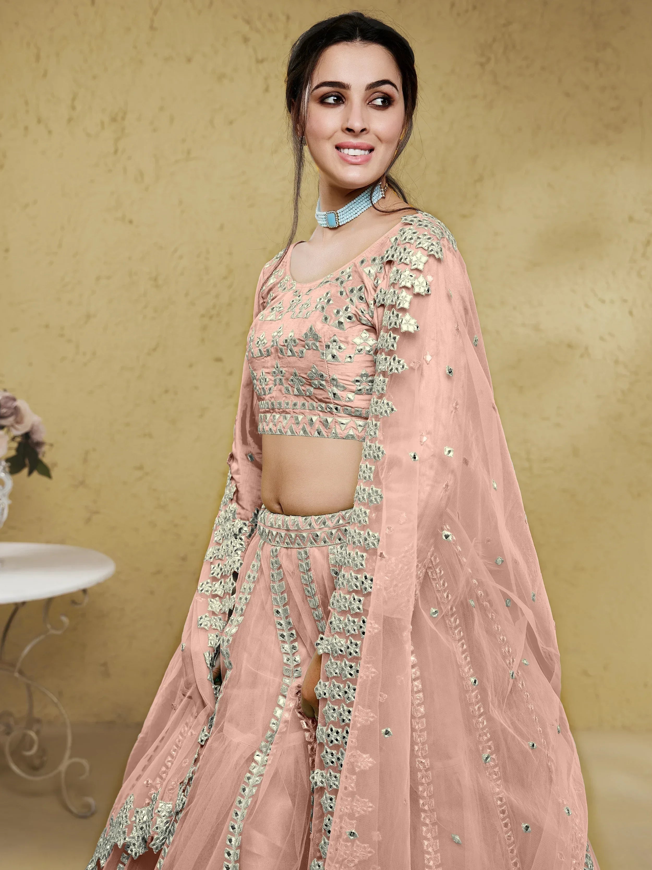 Pink Stunning Foil Work Net Wedding Lehenga Choli With Dupatta