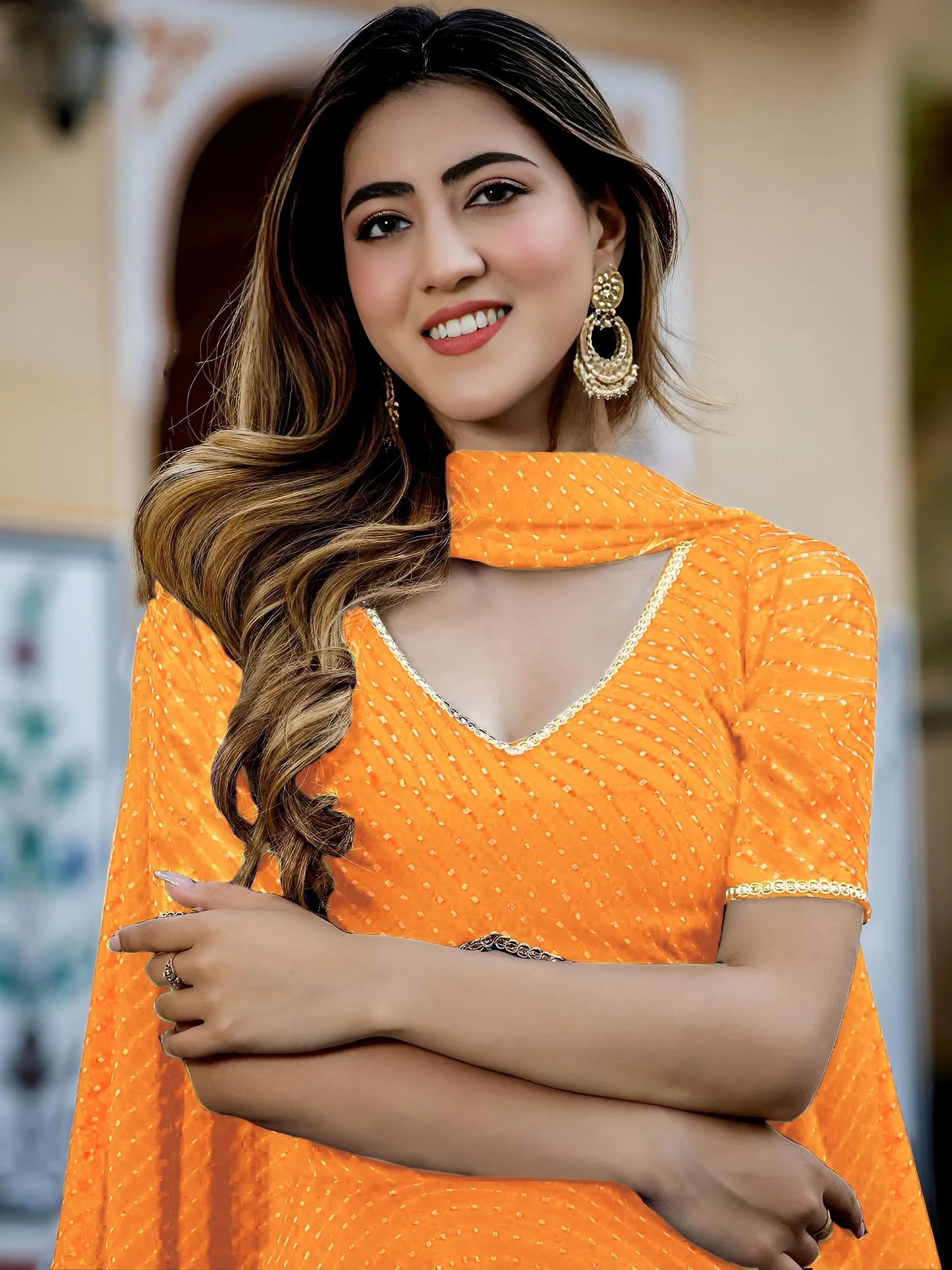 Orange Gorgeous Laheriya Print Georgette Wedding Wear Lehenga Choli