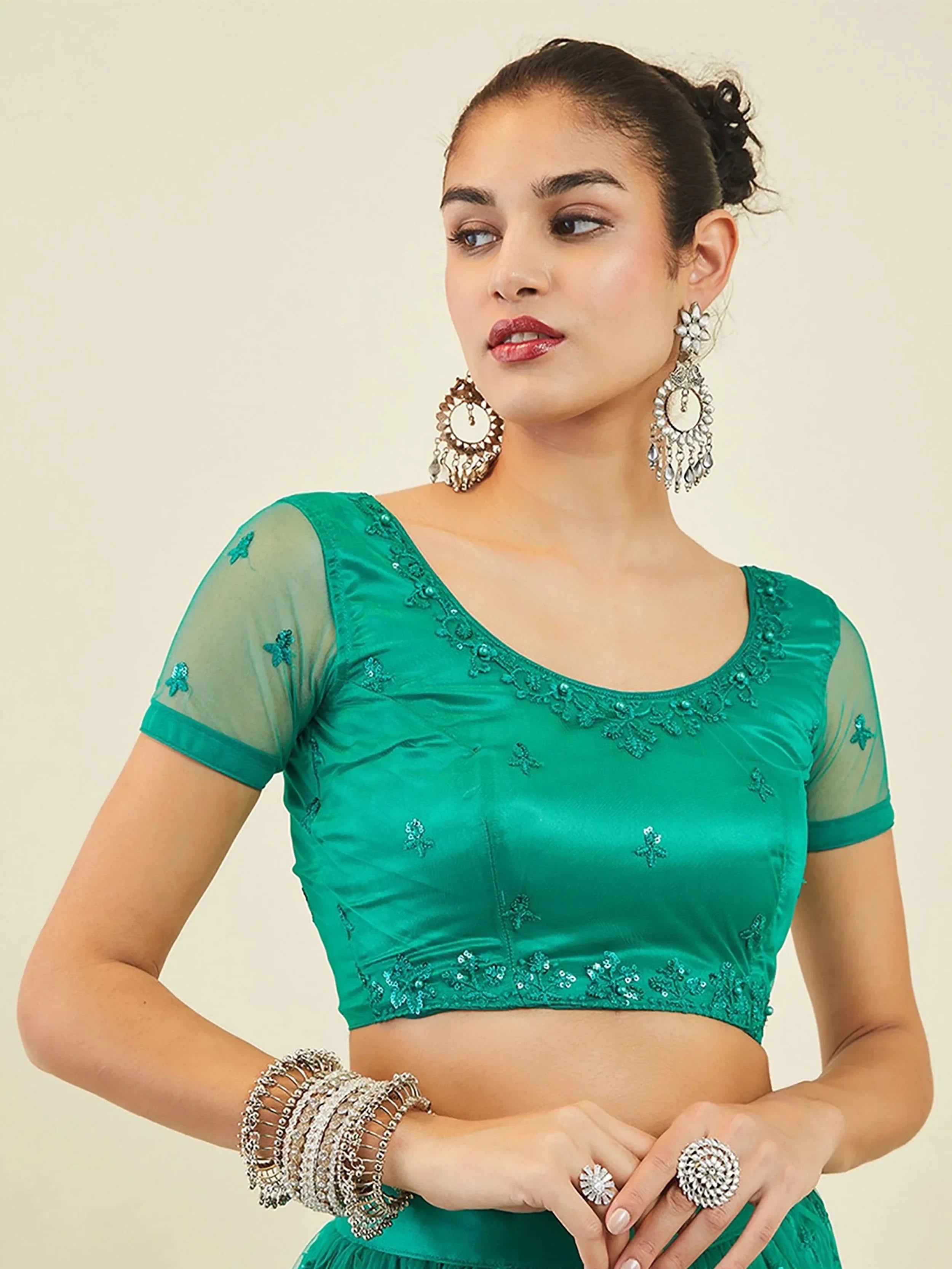 Teal Ravishing Sequins Net Reception Wear Lehenga Choli With Dupatta