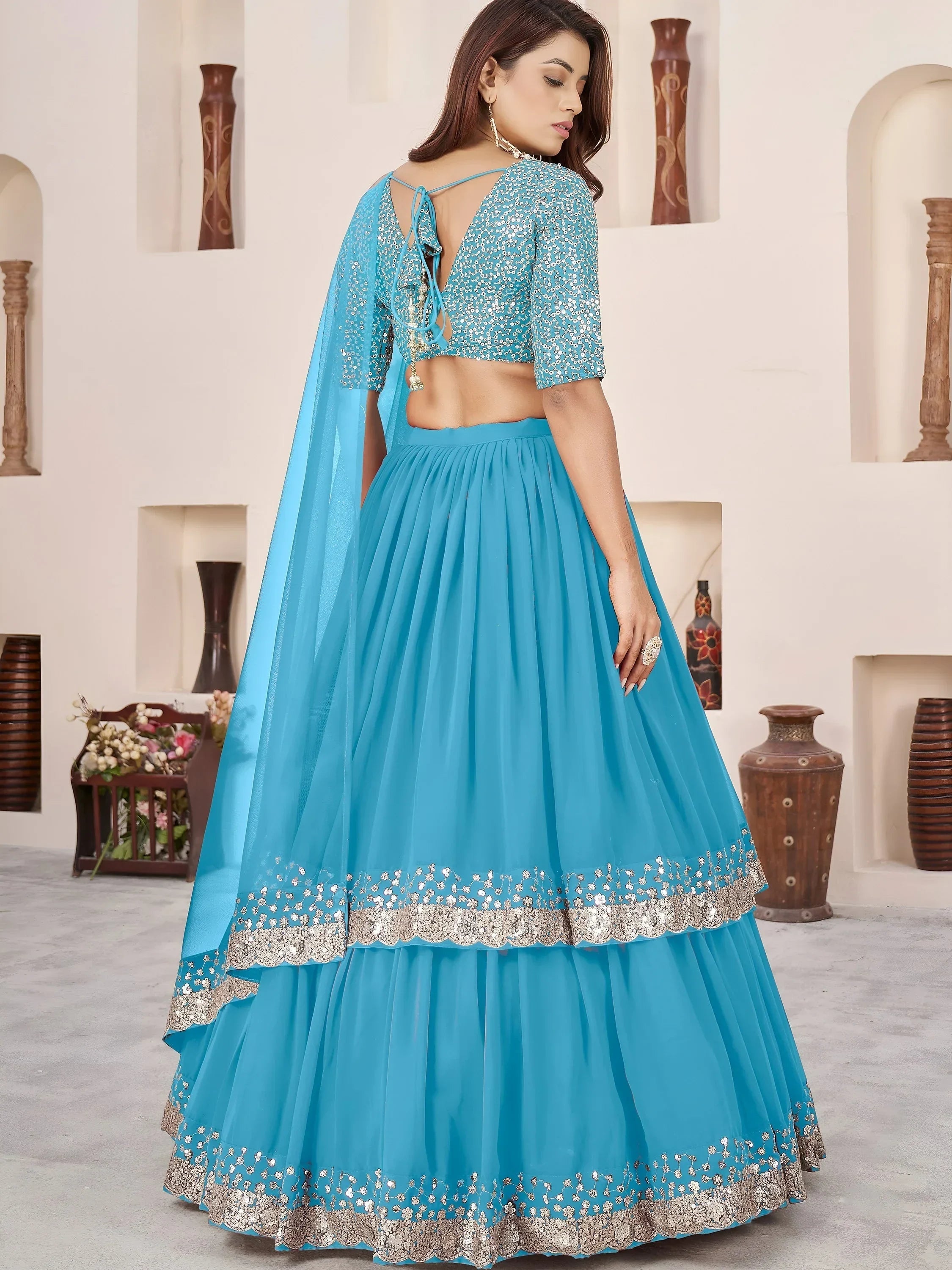 Sky Blue Amazing Sequins Georgette Reception Wear Lehenga Choli