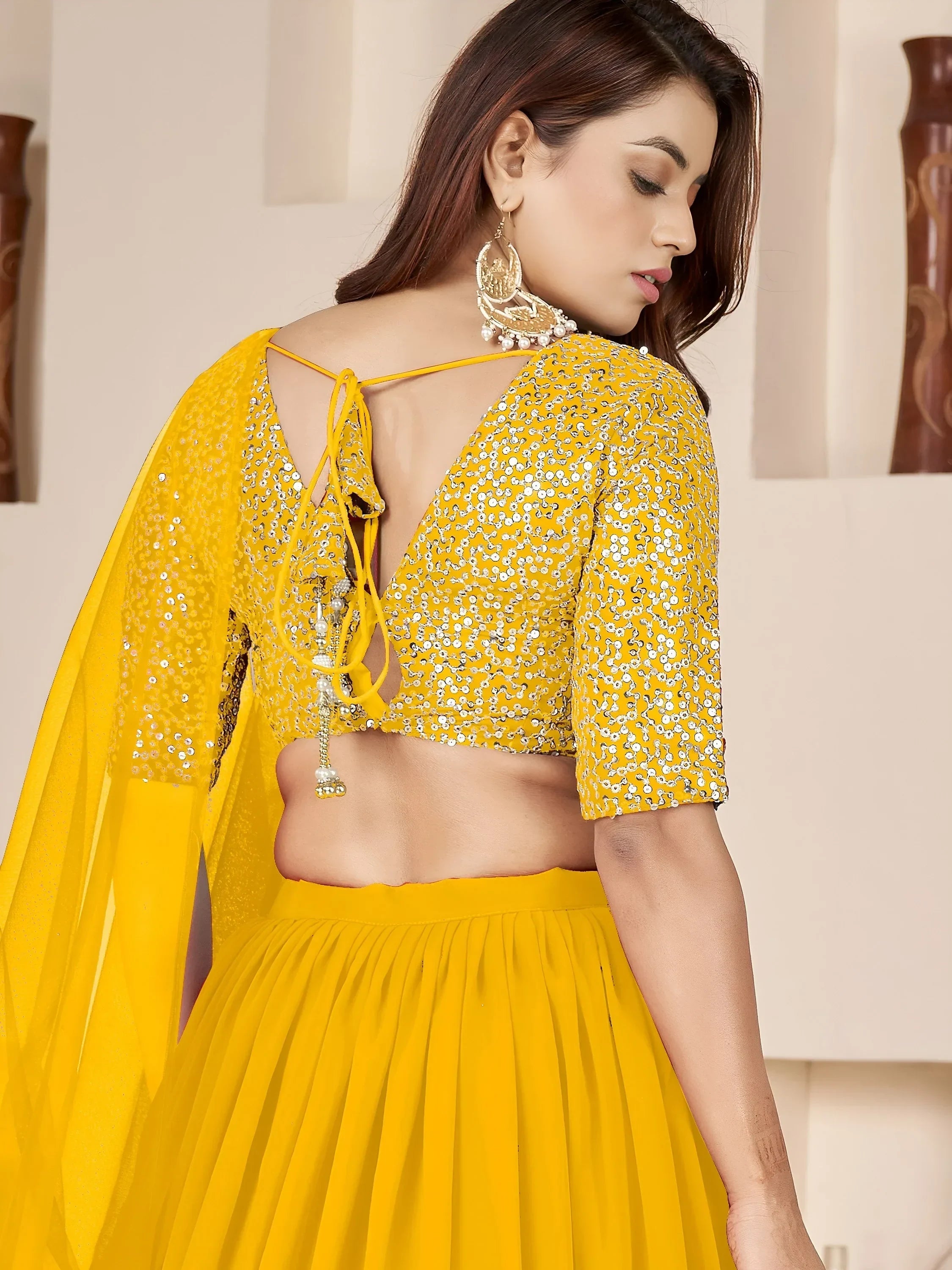 Yellow Amazing Sequins Georgette Reception Wear Lehenga Choli