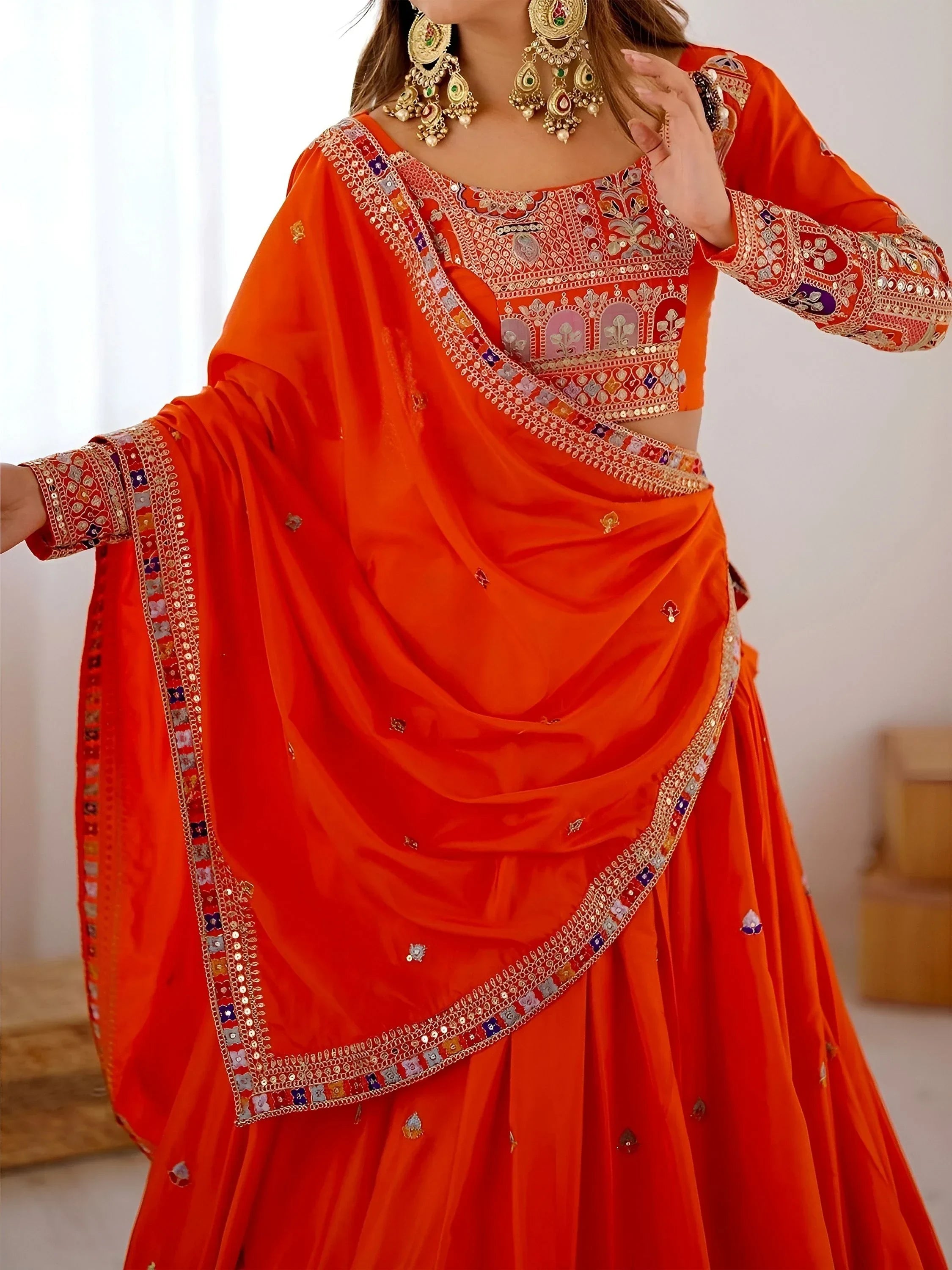 Orange Magnetic Coding Work Crepe Silk Designer Lehenga Choli