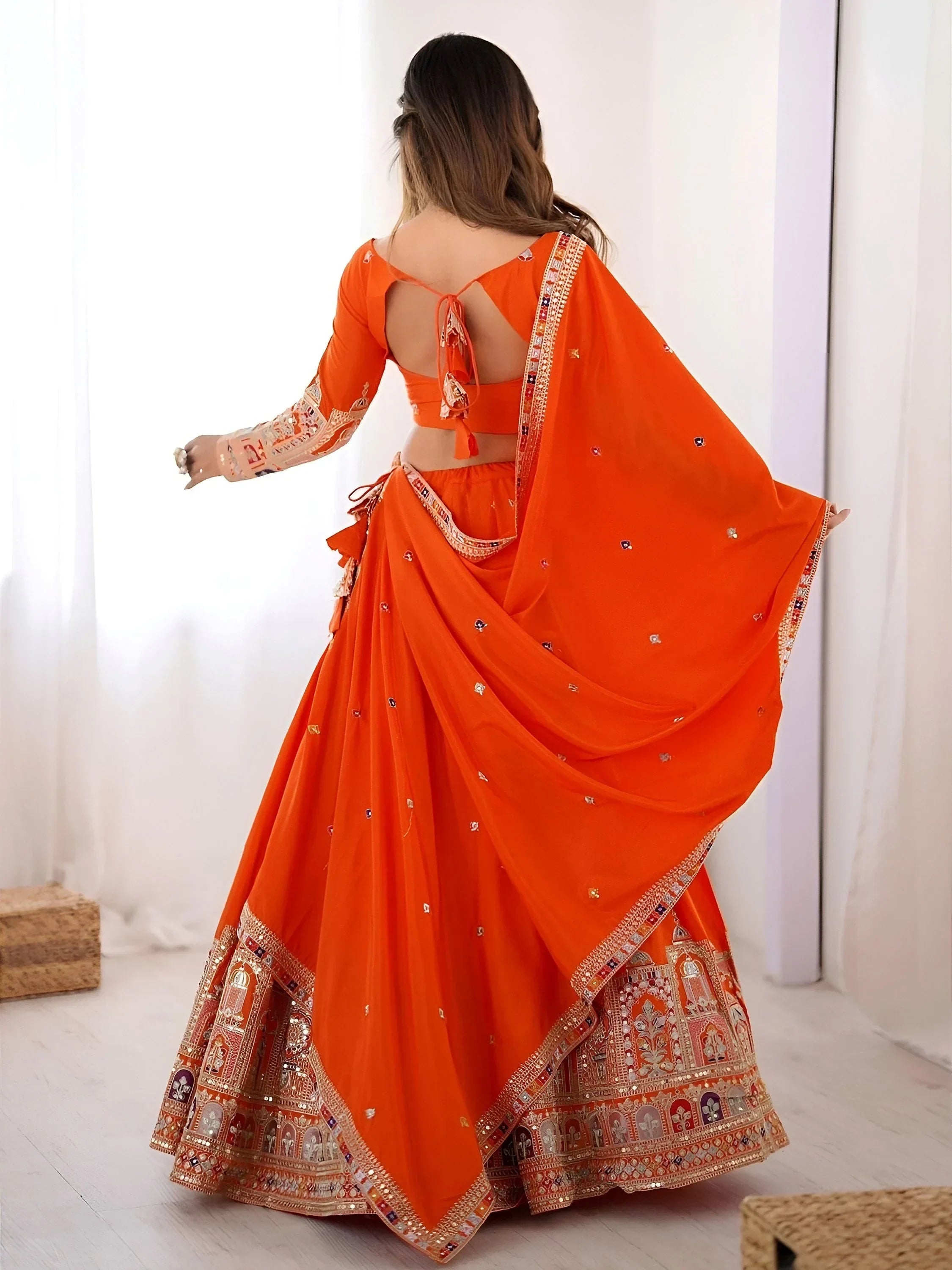 Orange Magnetic Coding Work Crepe Silk Designer Lehenga Choli