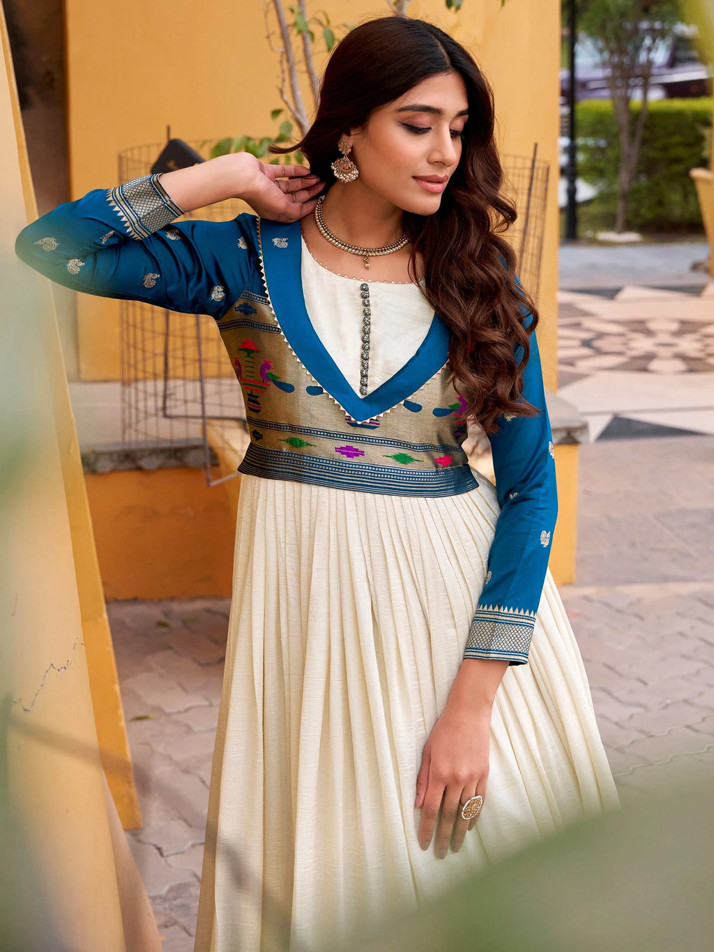 Mesmerizing Off White Zari Weaving Silk Festival Wear Gown