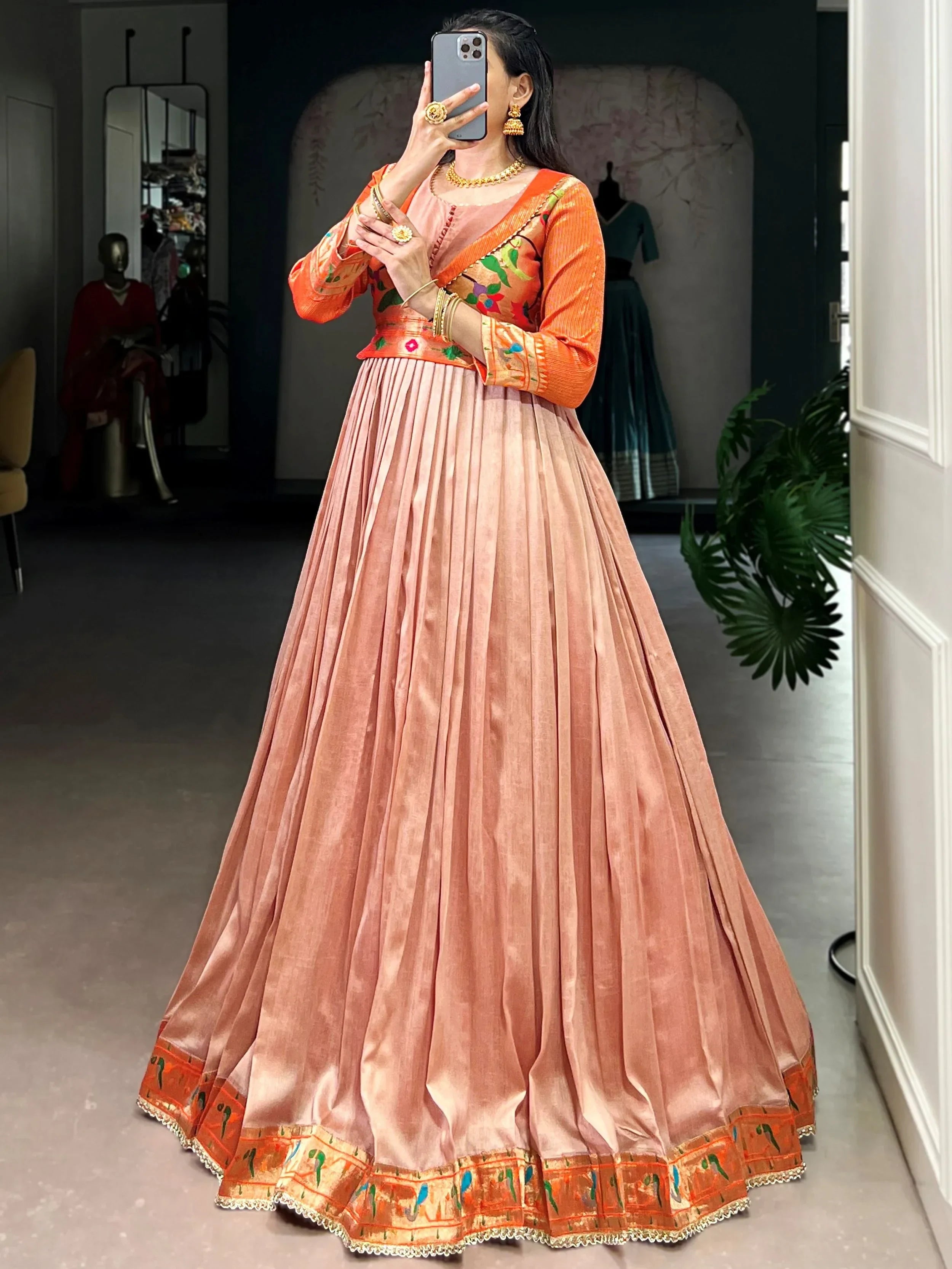 Peach Graceful Off-Zari Weaving Silk Festival Wear Gown