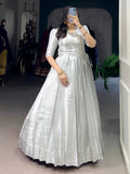 Awesome Off-White Zari Weaving Silk Festive Wear Gown With Koti