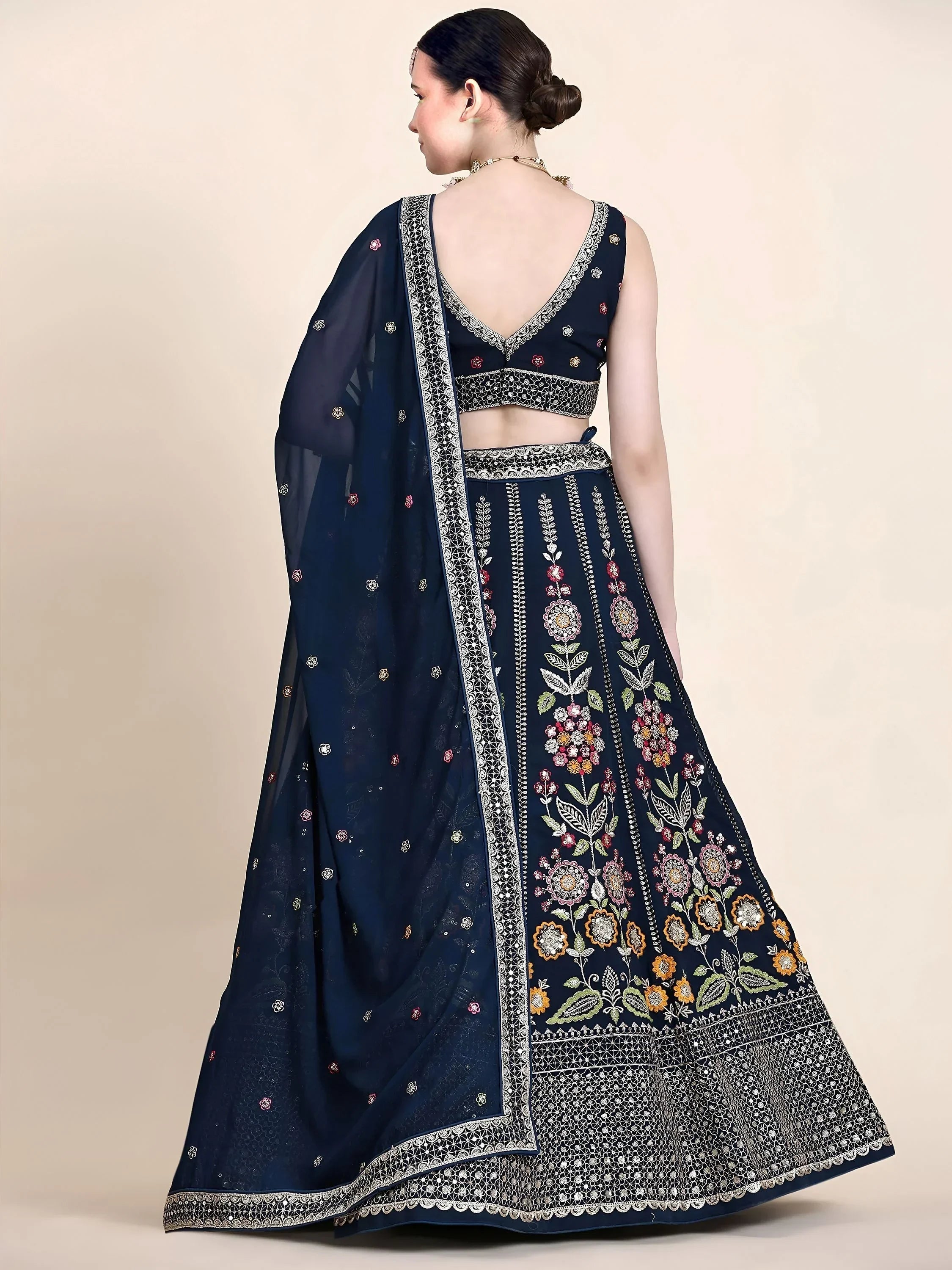 Outstanding Navy Blue Floral Embroidered Georgette Sangeet Wear Lehenga Choli