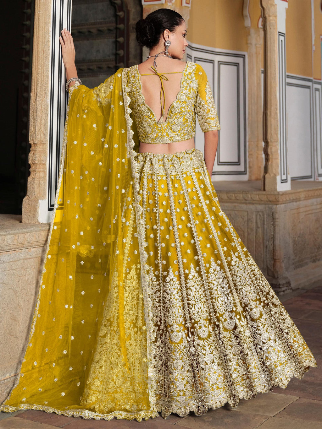 Yellow Alluring Sequins Net Engagement Wear Lehenga Choli With Dupatta