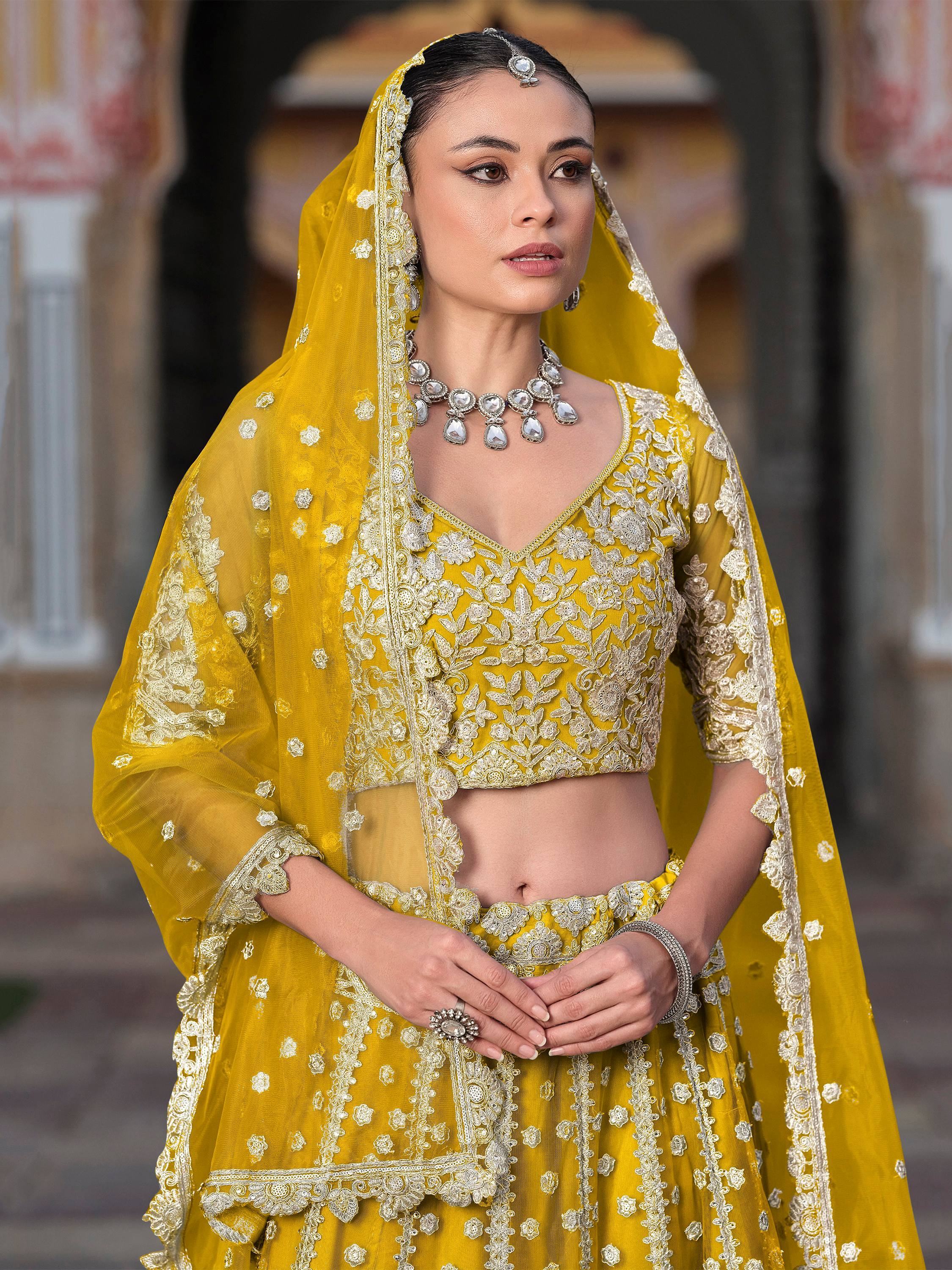 Yellow Alluring Sequins Net Engagement Wear Lehenga Choli With Dupatta