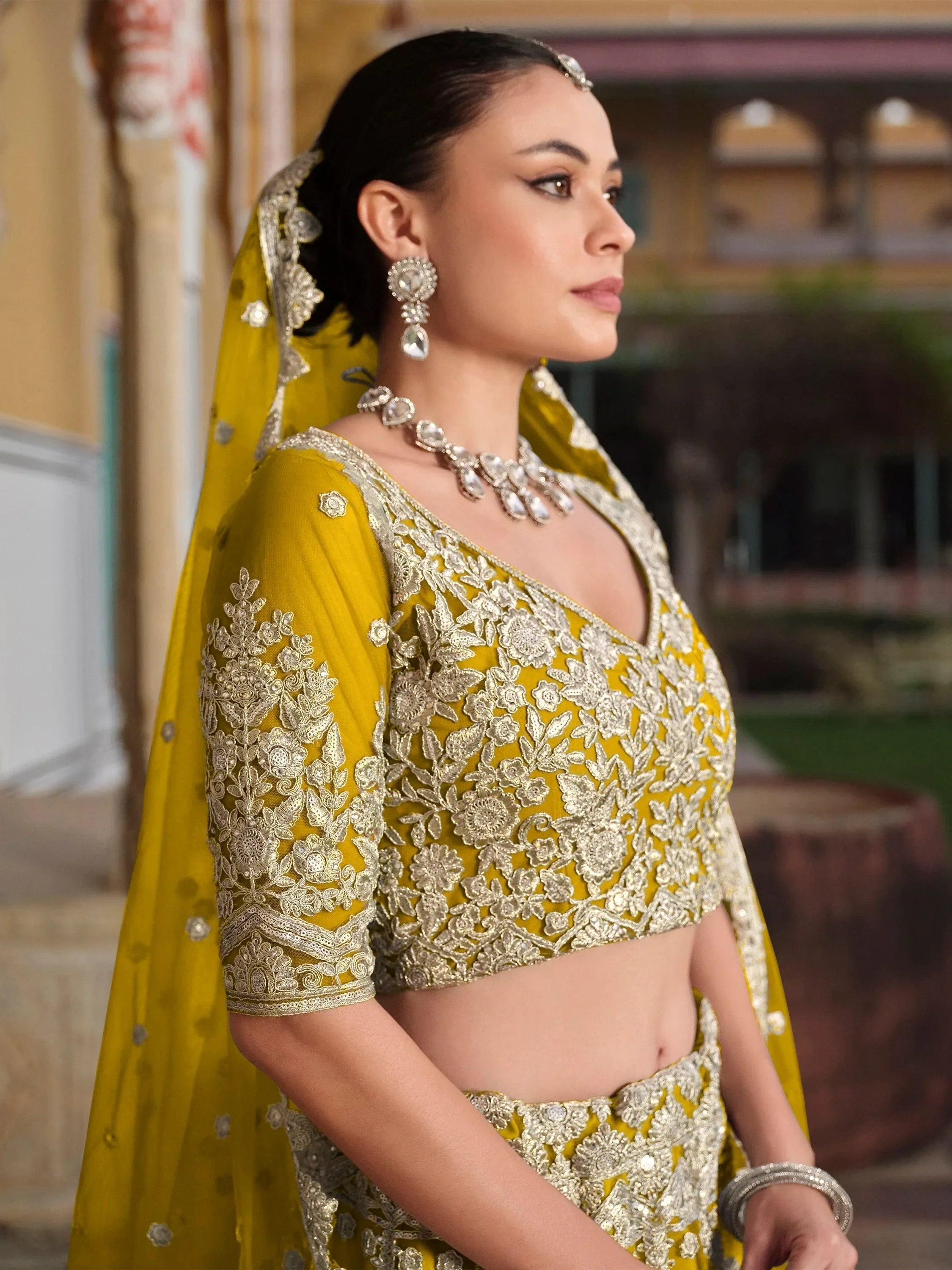 Yellow Alluring Sequins Net Engagement Wear Lehenga Choli With Dupatta