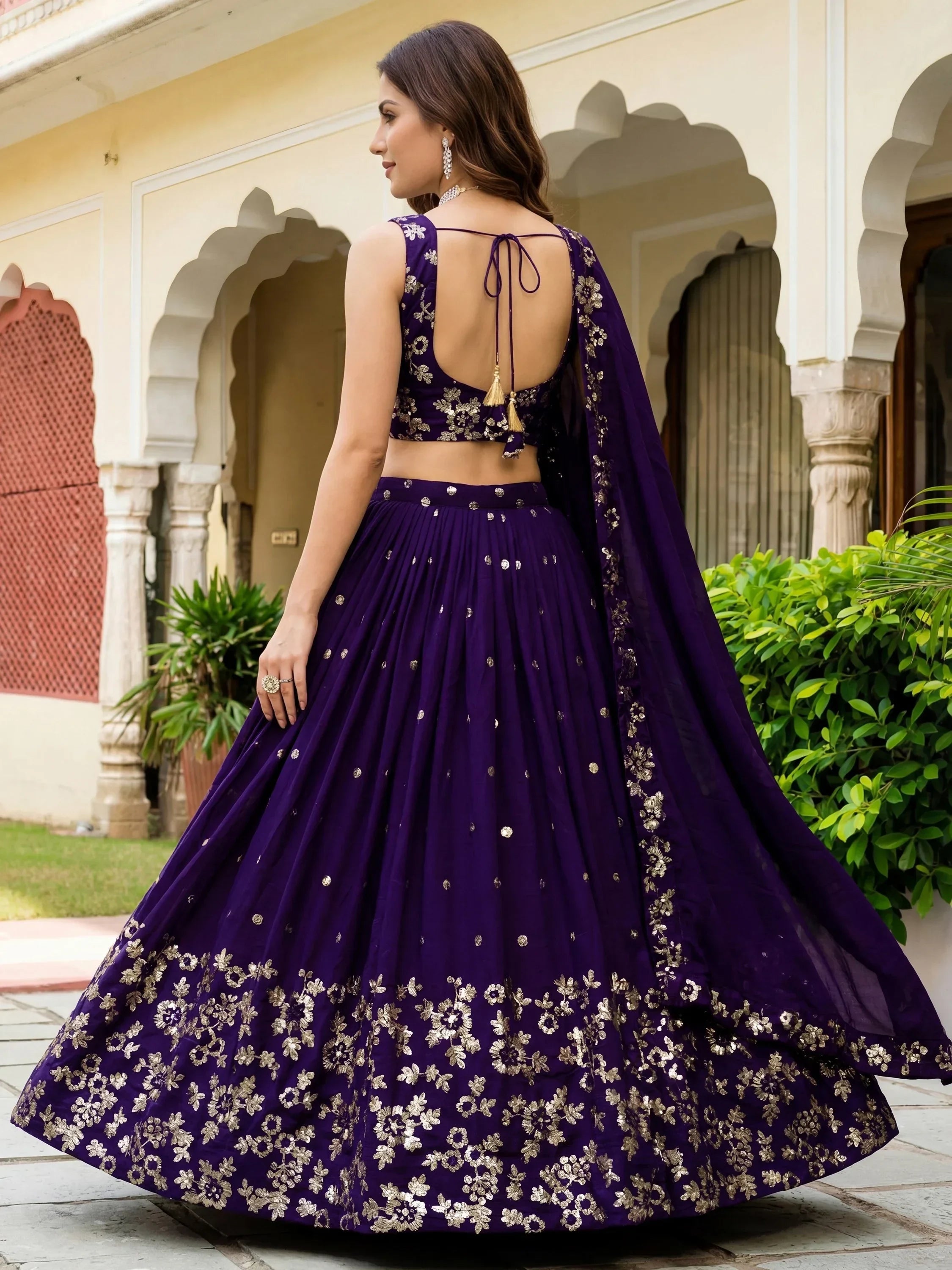 Outstanding Purple Sequins Georgette Wedding Wear Lehenga Choli