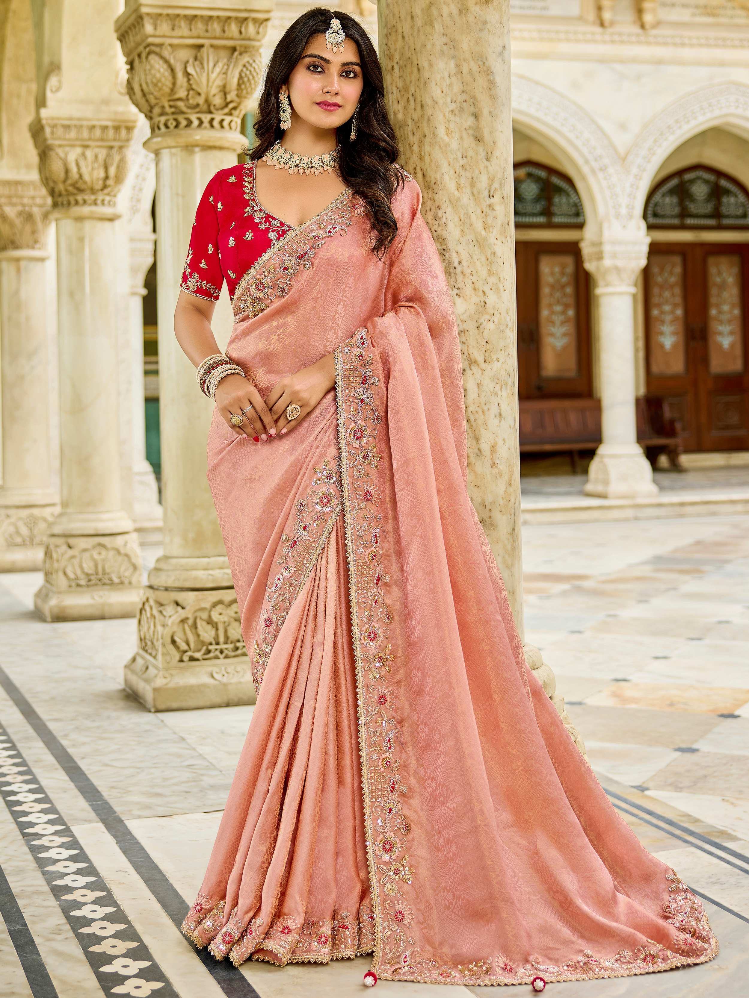 Enchanting Peach Embroidered Tissue Festival Wear Saree With Blouse