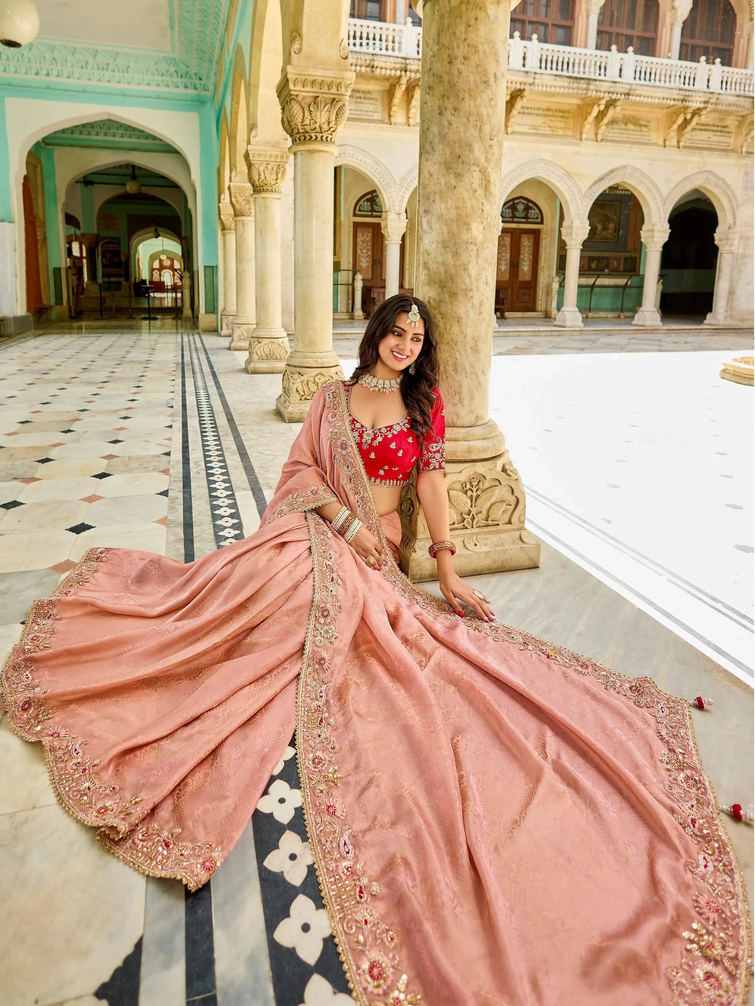 Enchanting Peach Embroidered Tissue Festival Wear Saree With Blouse