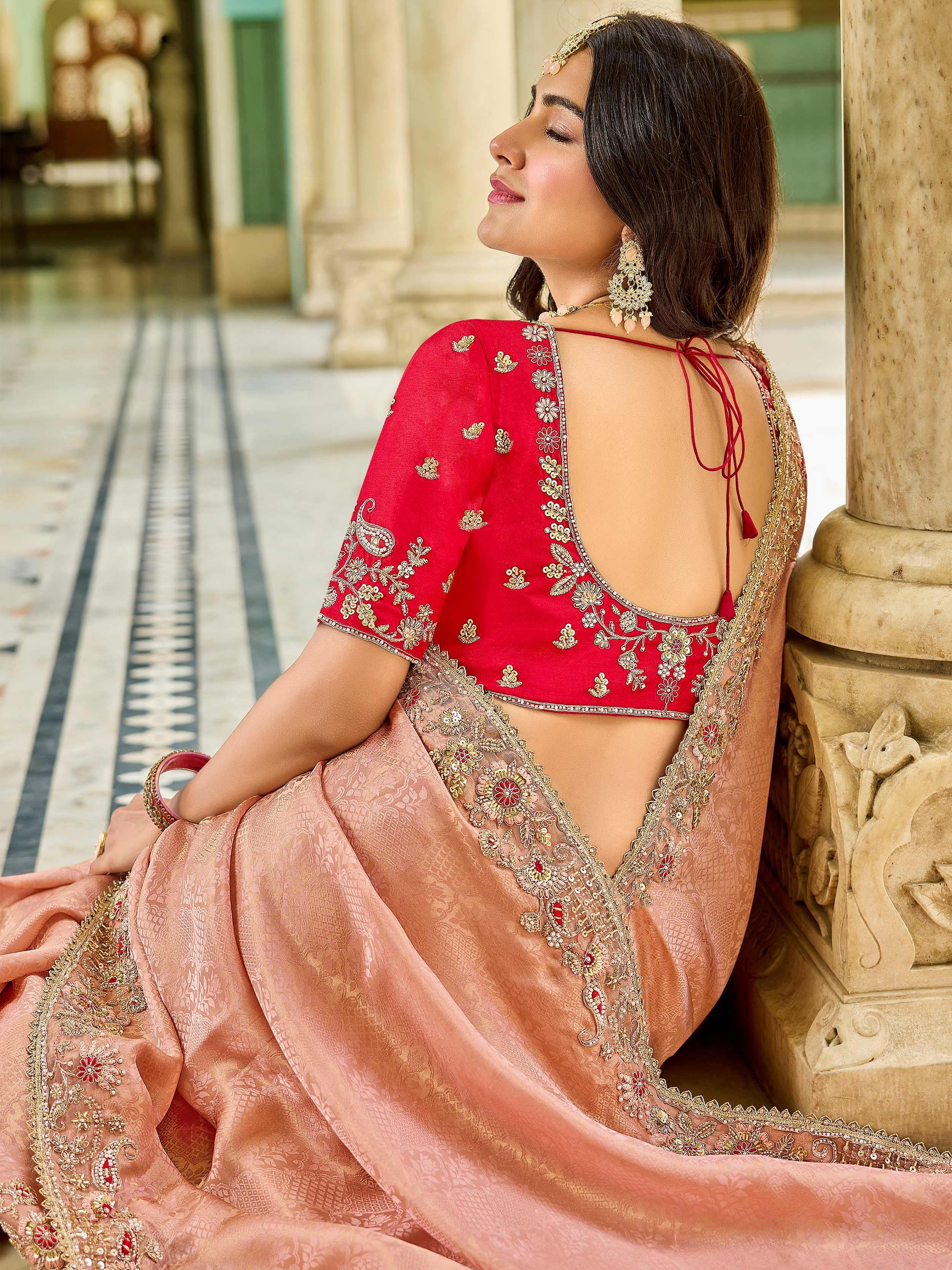 Enchanting Peach Embroidered Tissue Festival Wear Saree With Blouse