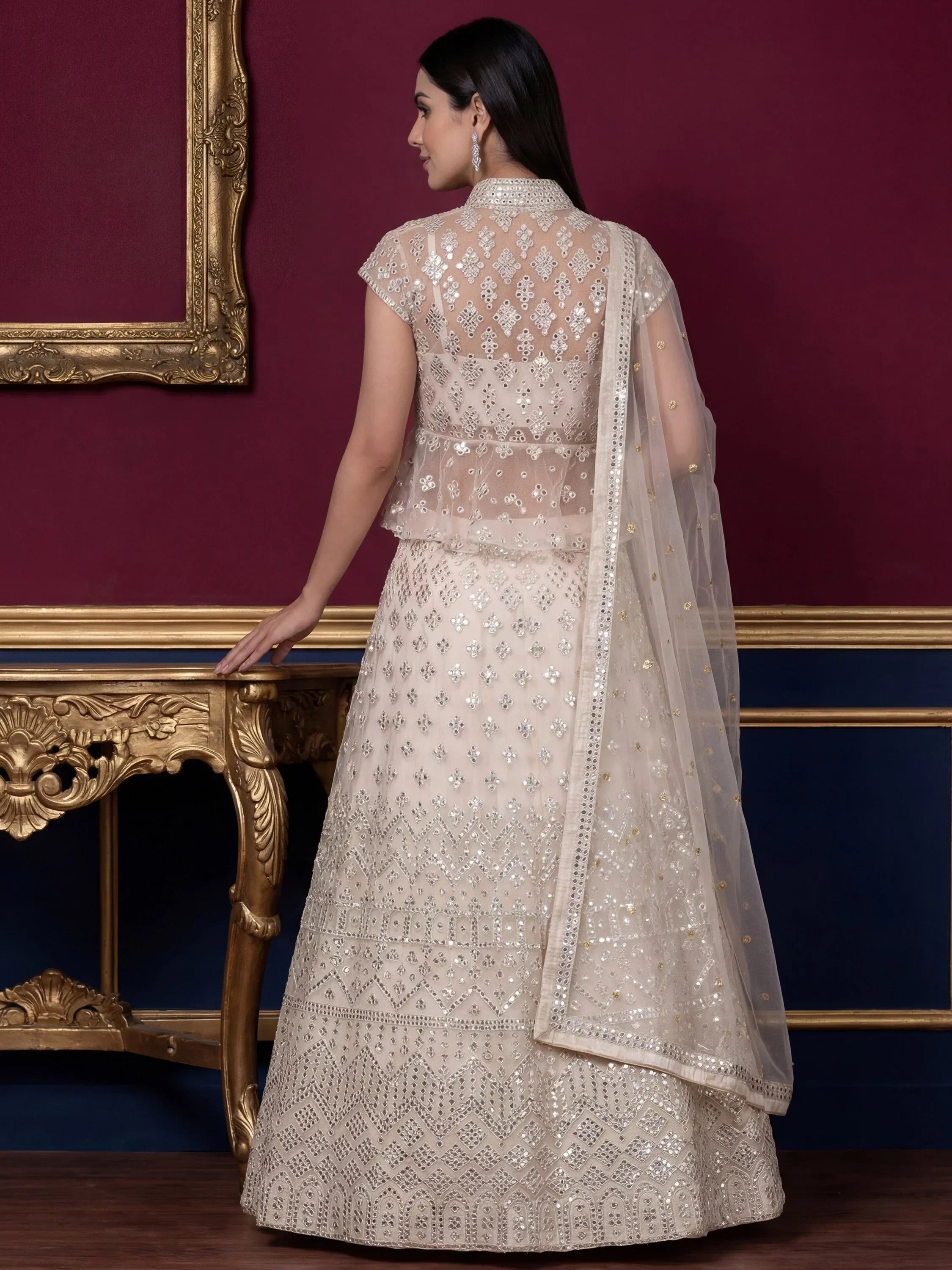 Beautiful Off-White Embroidered Net Party Wear Lehenga Choli