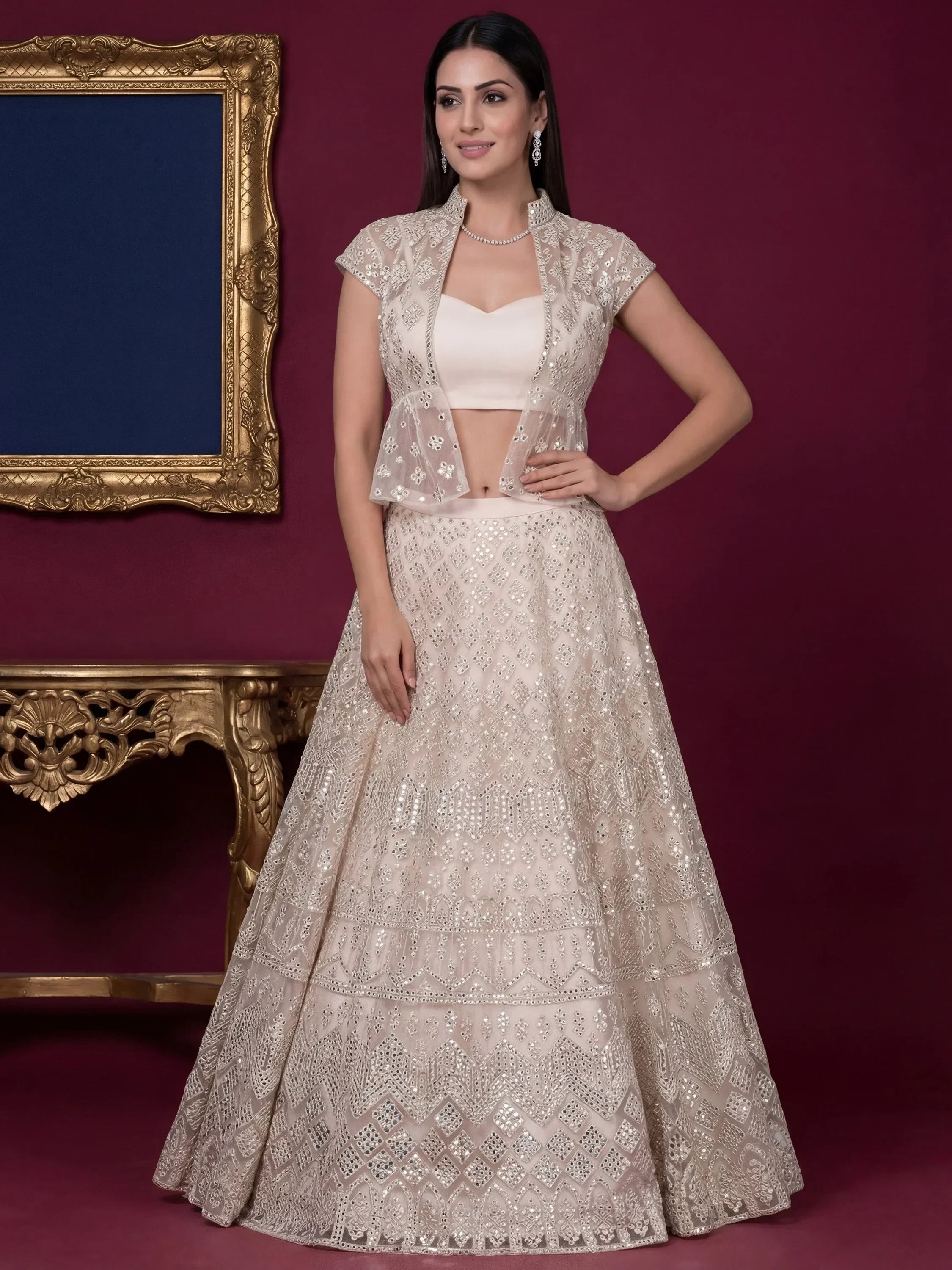 Beautiful Off-White Embroidered Net Party Wear Lehenga Choli