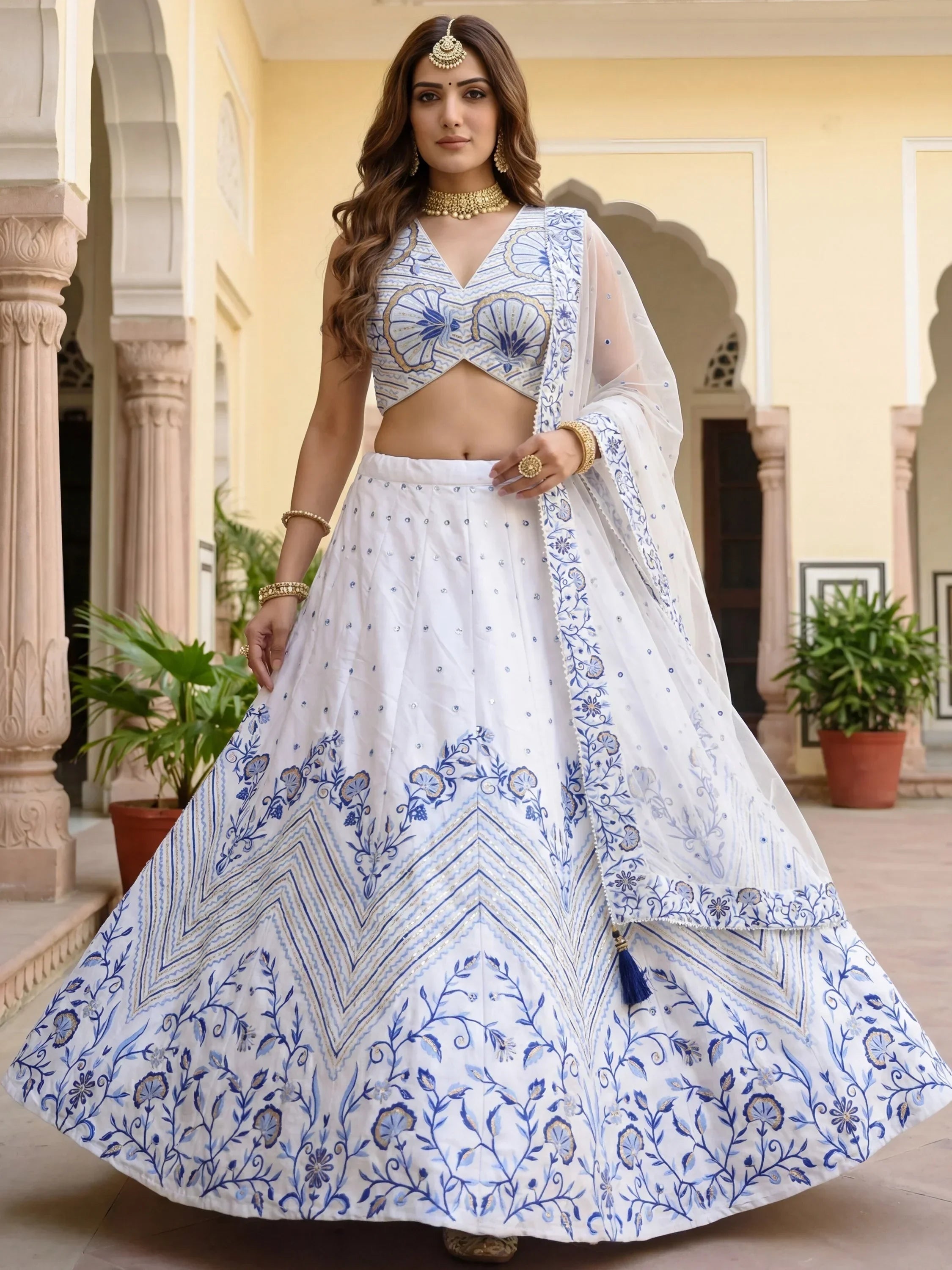 Awesome White Embroidered Satin Sangeet Wear Lehenga Choli