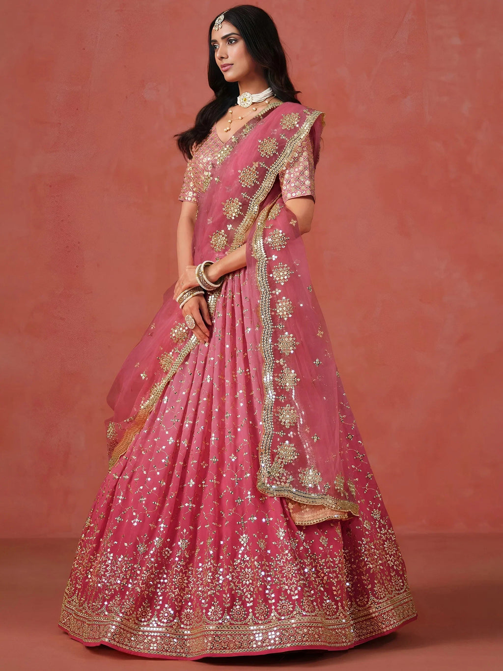 Peach Gorgeous Georgette Zari Embroidered Lehenga Choli With Dupatta