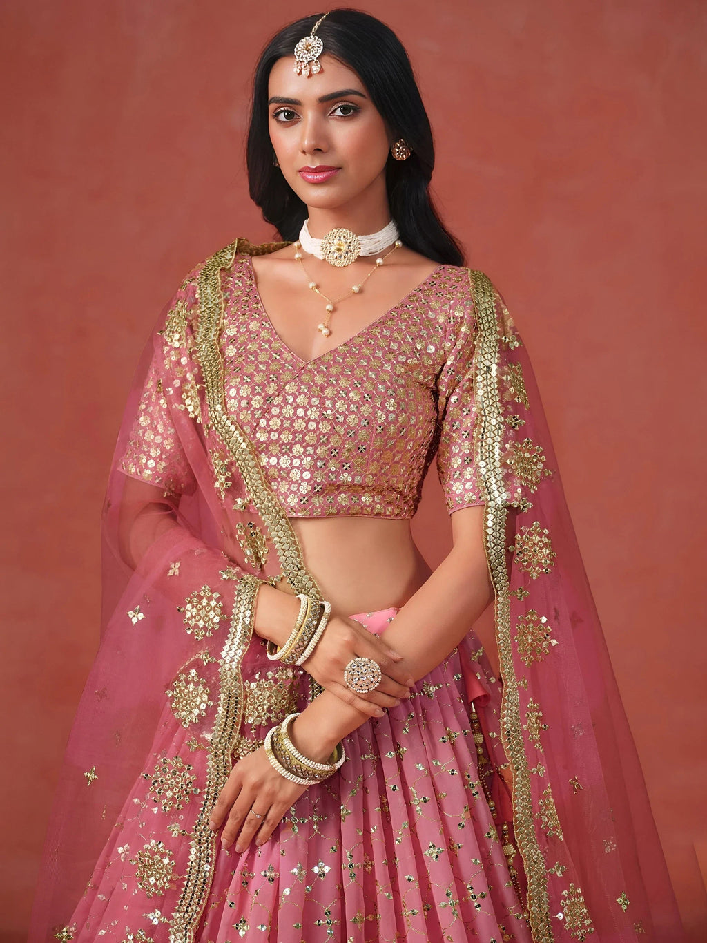 Peach Gorgeous Georgette Zari Embroidered Lehenga Choli With Dupatta