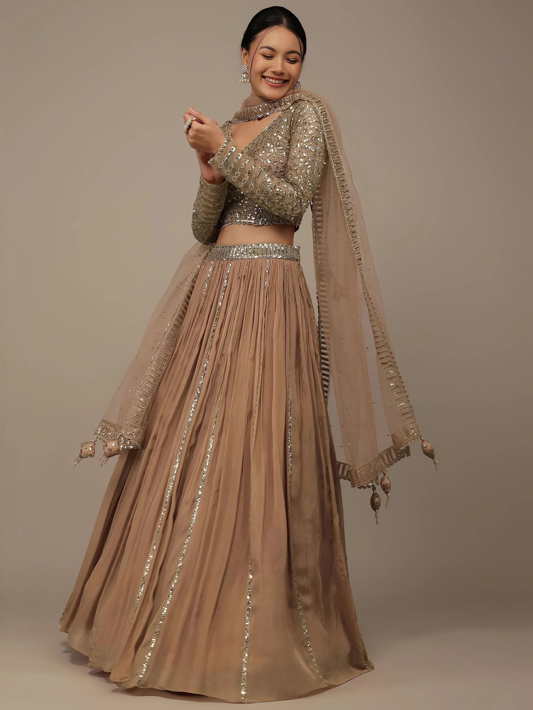 Beige Gorgeous Sequins Georgette Party Wear Lehenga Choli