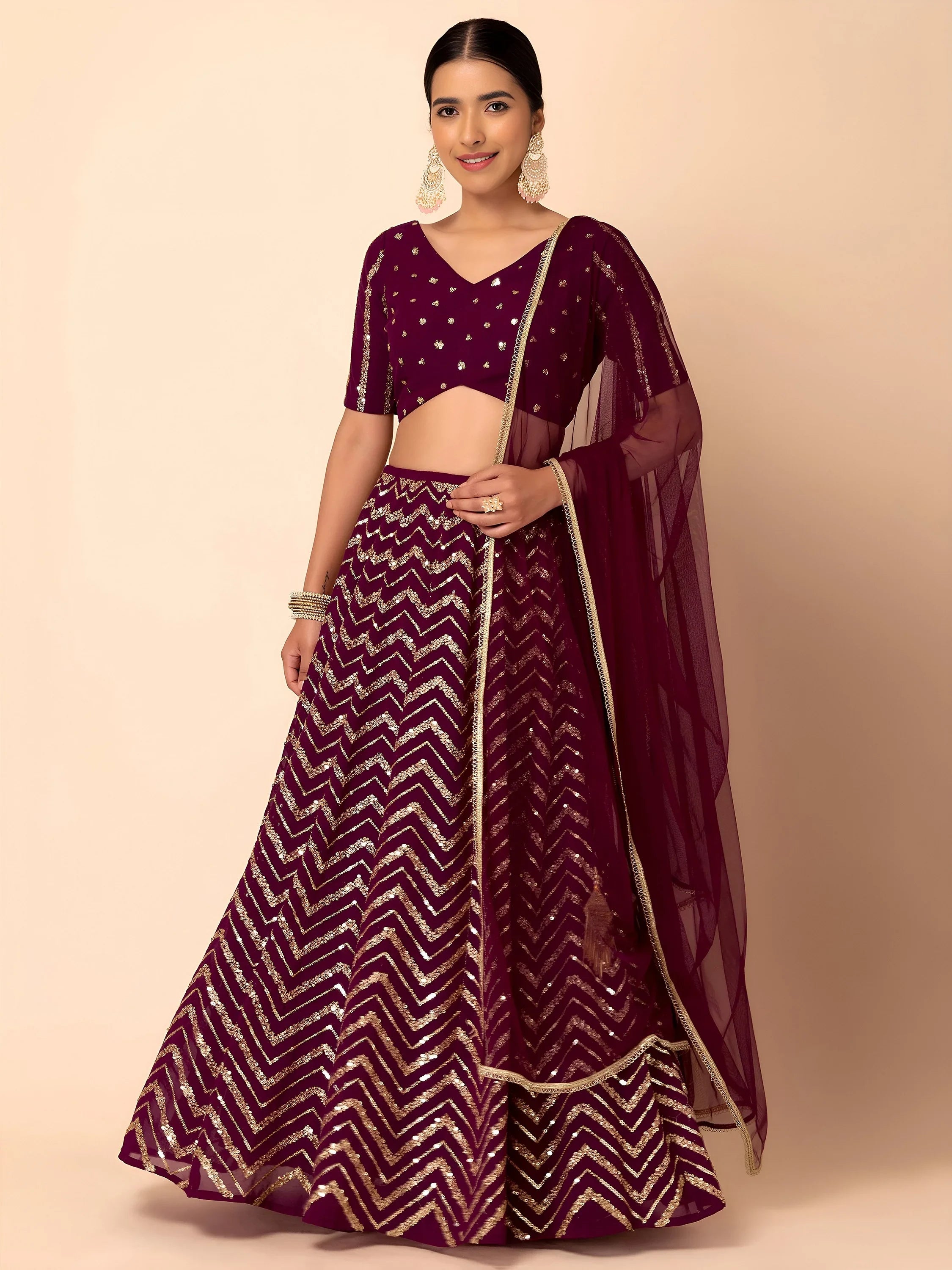 Maroon Lovely Zari Embroidered Georgette Reception Wear Lehenga Choli