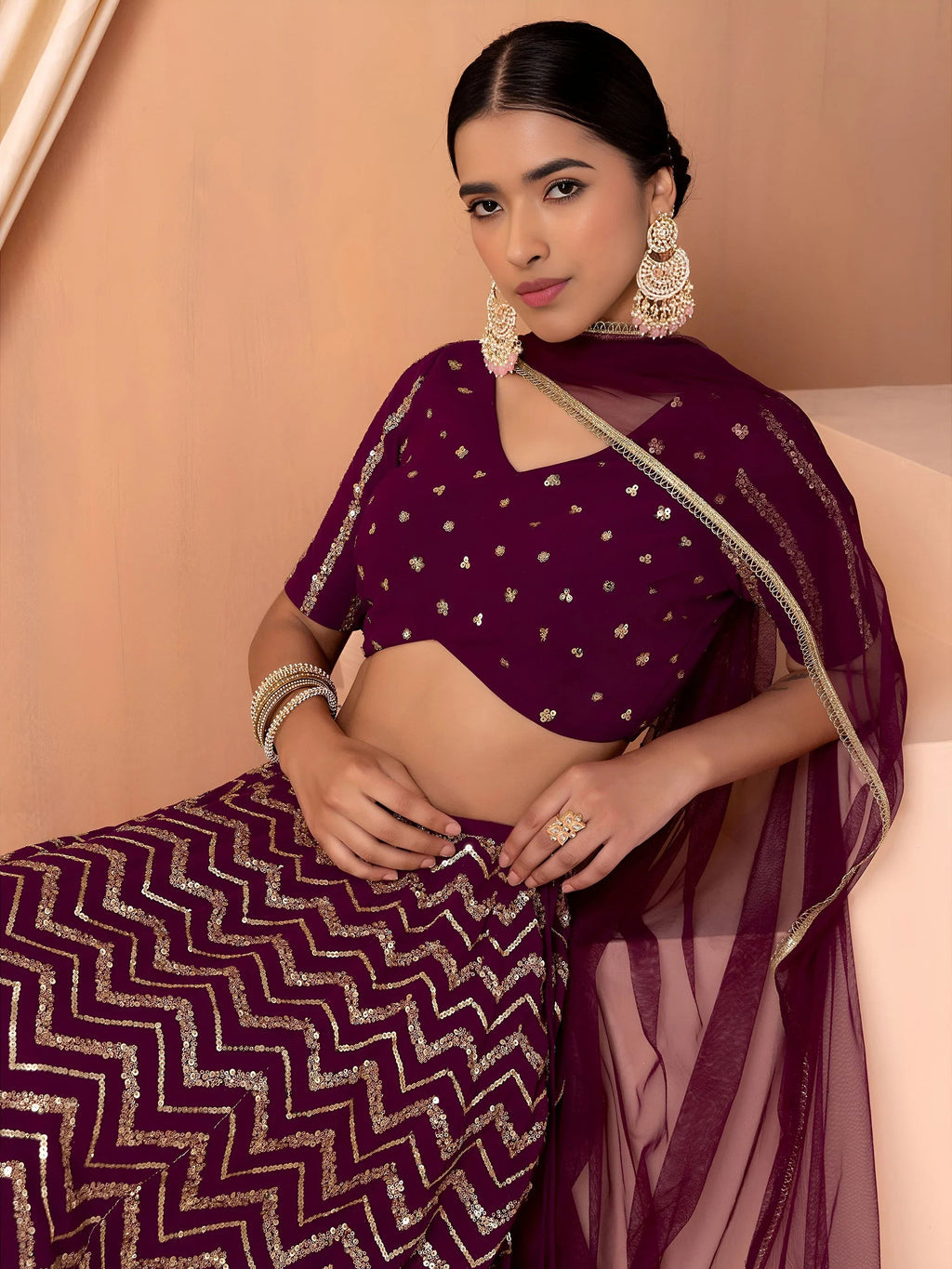 Maroon Lovely Zari Embroidered Georgette Reception Wear Lehenga Choli