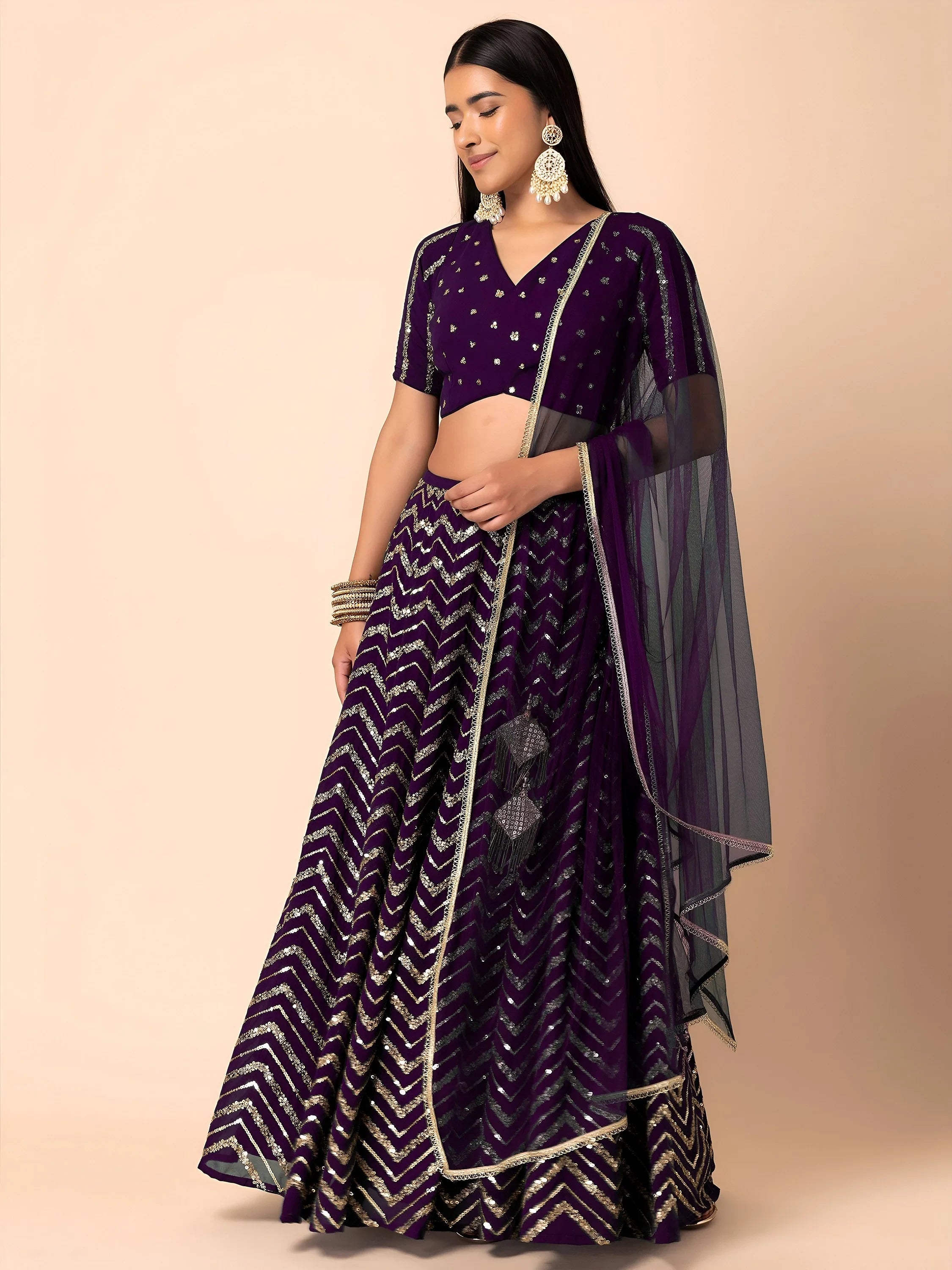 Purple Lovely Zari Embroidered Georgette Reception Wear Lehenga Choli