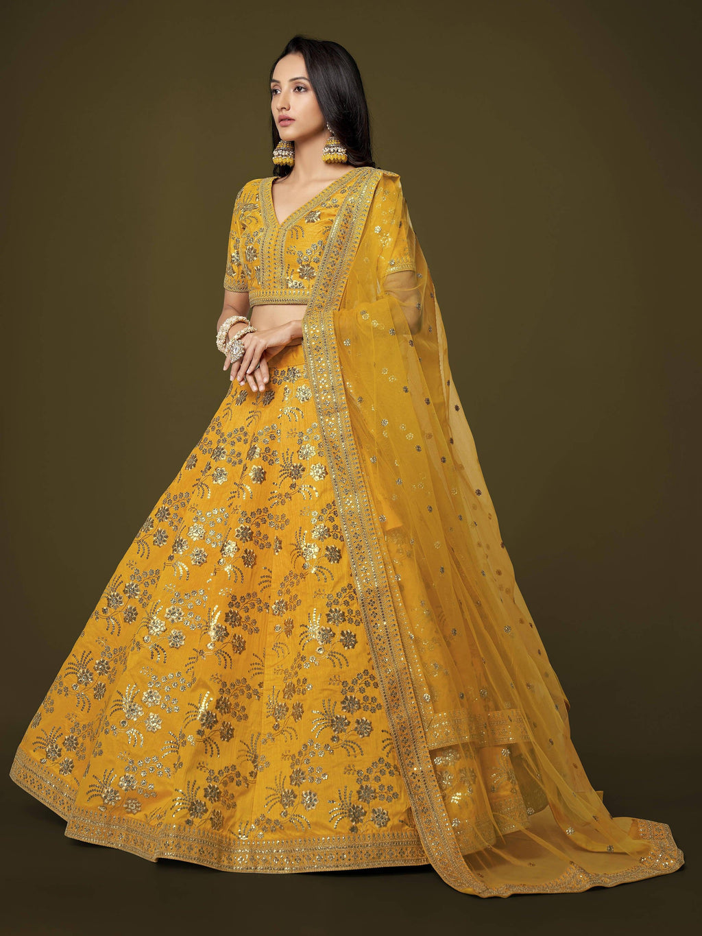 Fascinating Yellow Sequins Embroidery Slub Silk Lehenga Choli