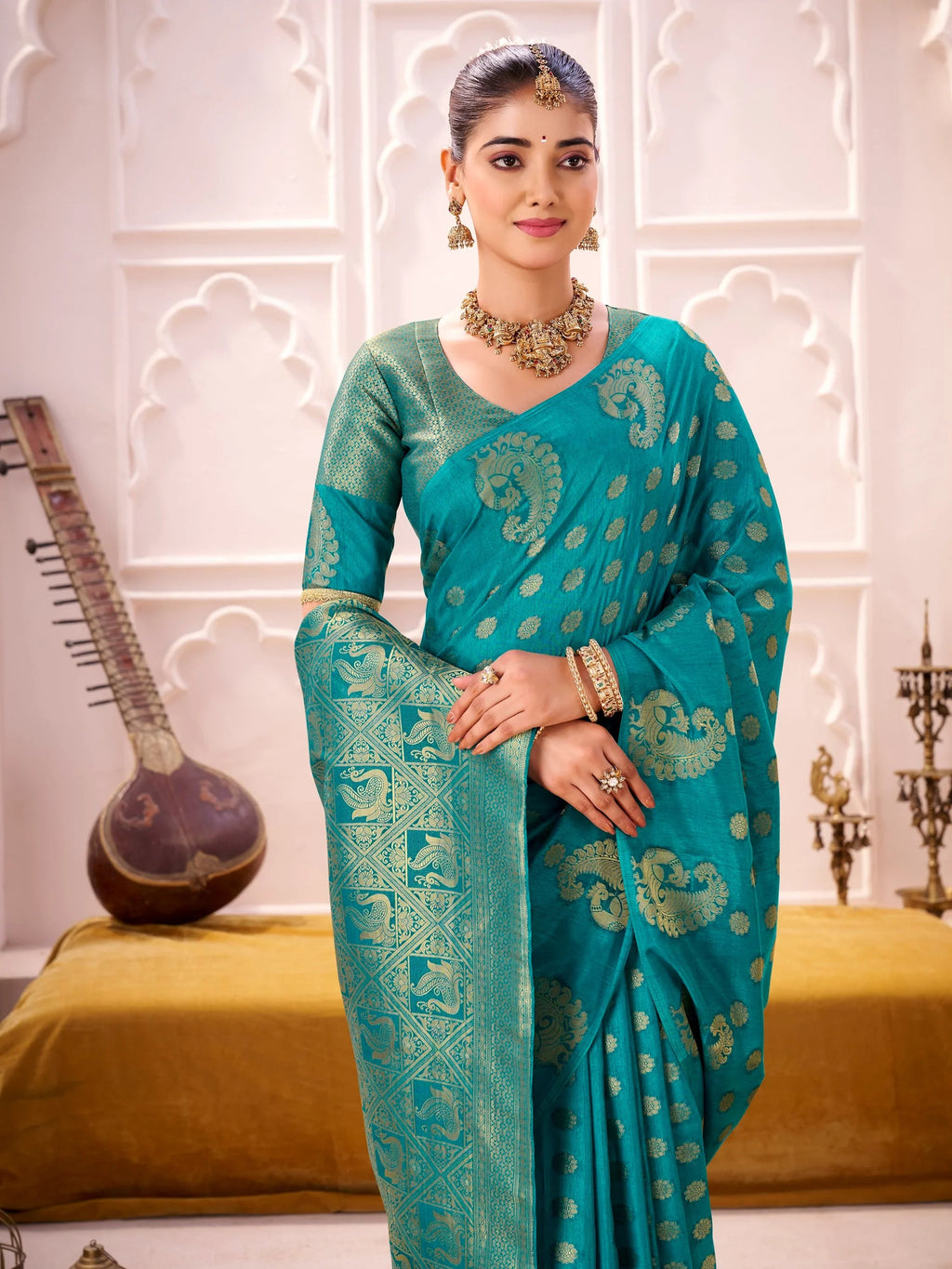 Teal Impressive Zari Weaving Silk Engagement Wear Saree With Blouse
