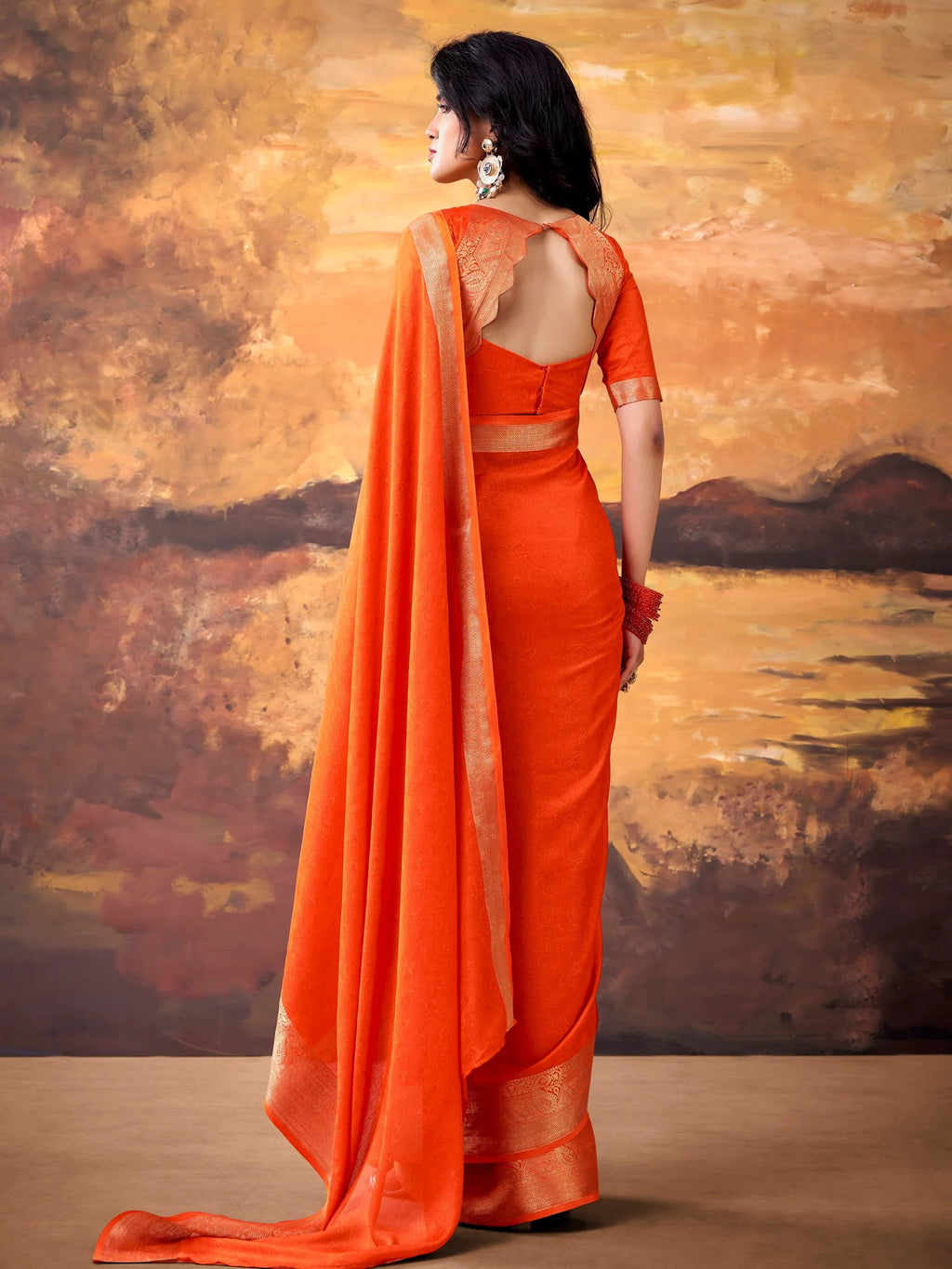 Orange Aesthetic Zari Border Georgette Evening Wear Saree With Blouse