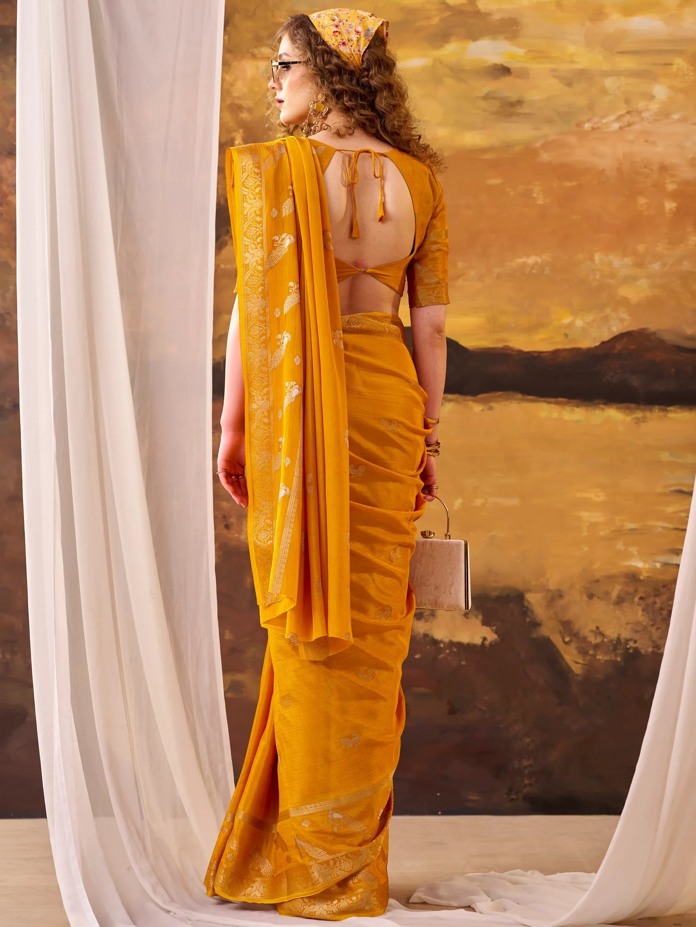 Mustard Bewitching Zari Weaving Crepe Festive Wear Saree With Blouse