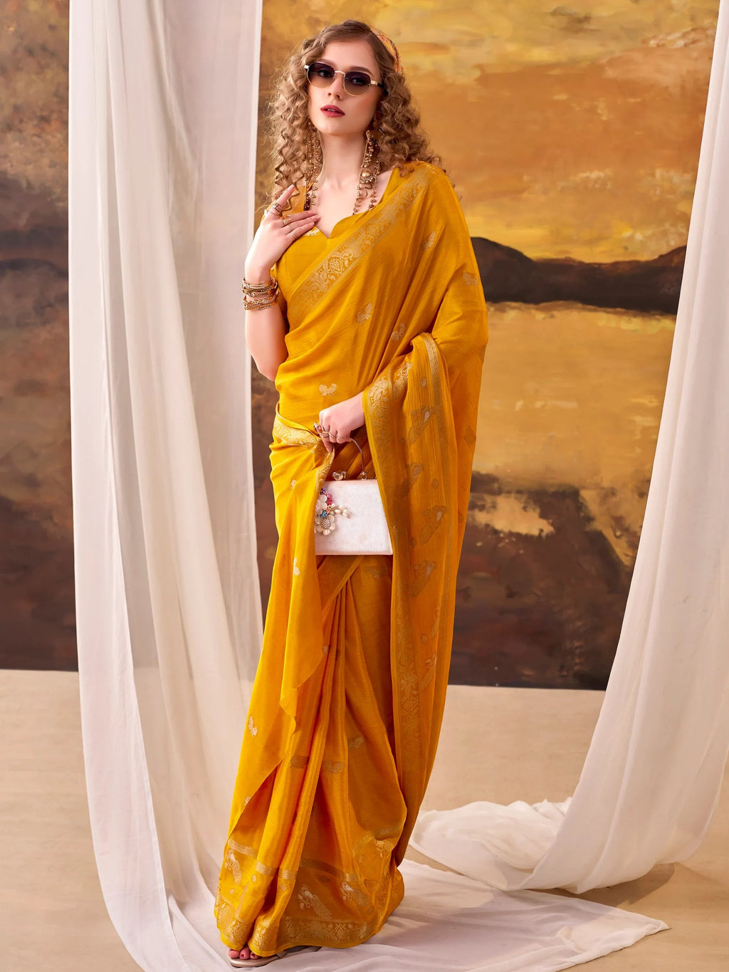 Mustard Bewitching Zari Weaving Crepe Festive Wear Saree With Blouse