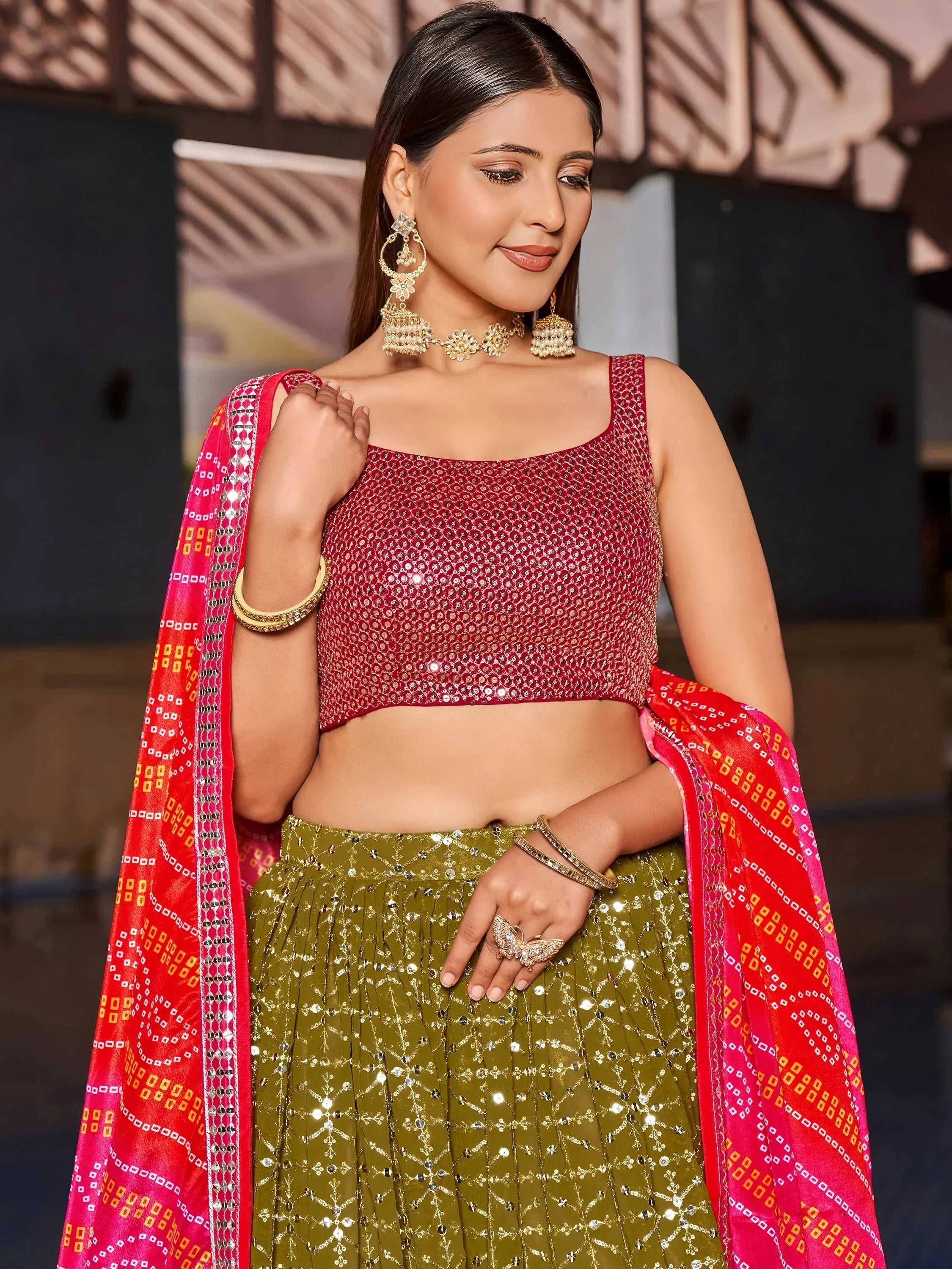Marvelous Olive Green Sequins Georgette Sangeet Wear Lehenga Choli
