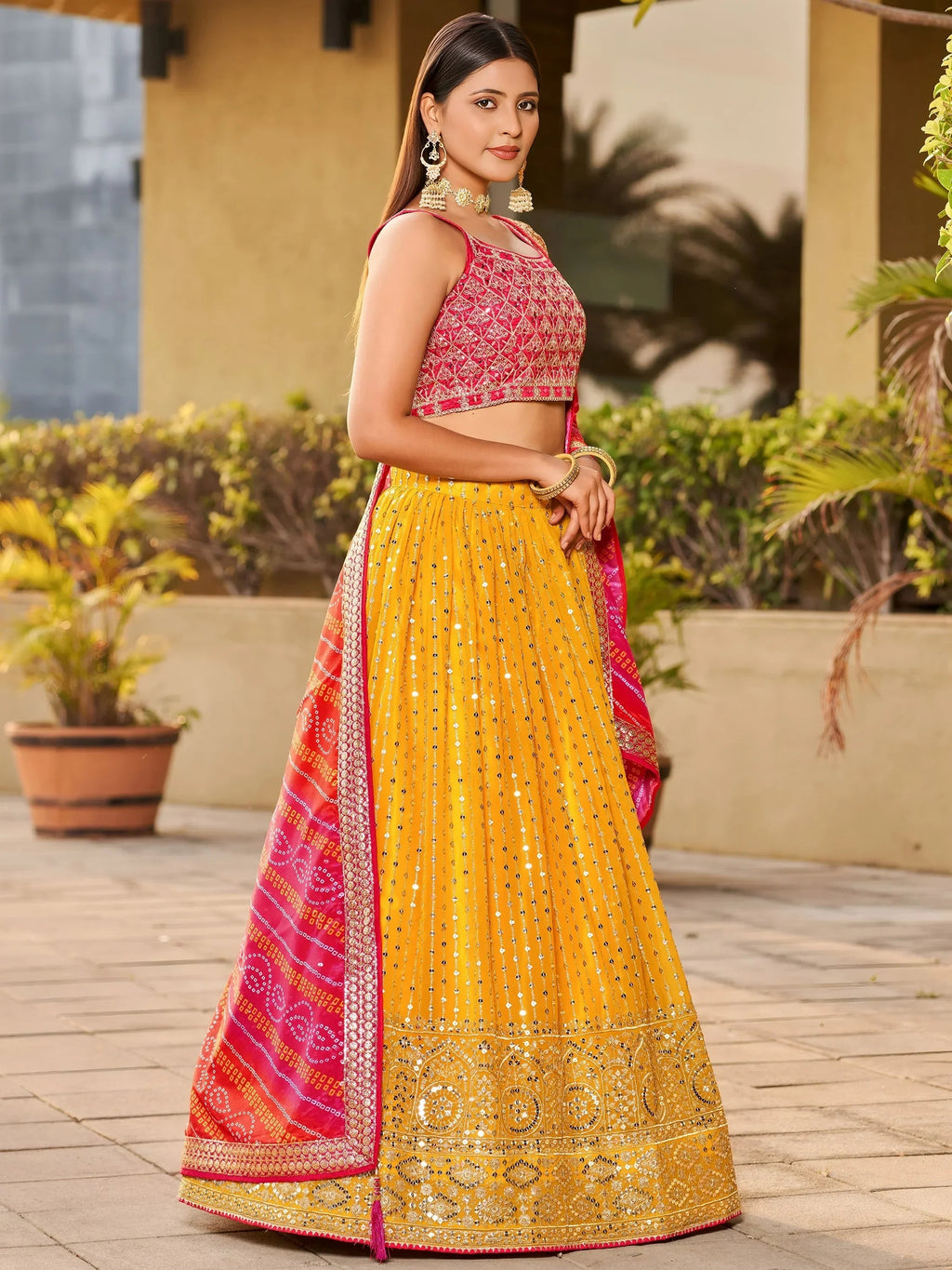 Stunning Yellow Sequins Georgette Wedding Wear Lehenga Choli