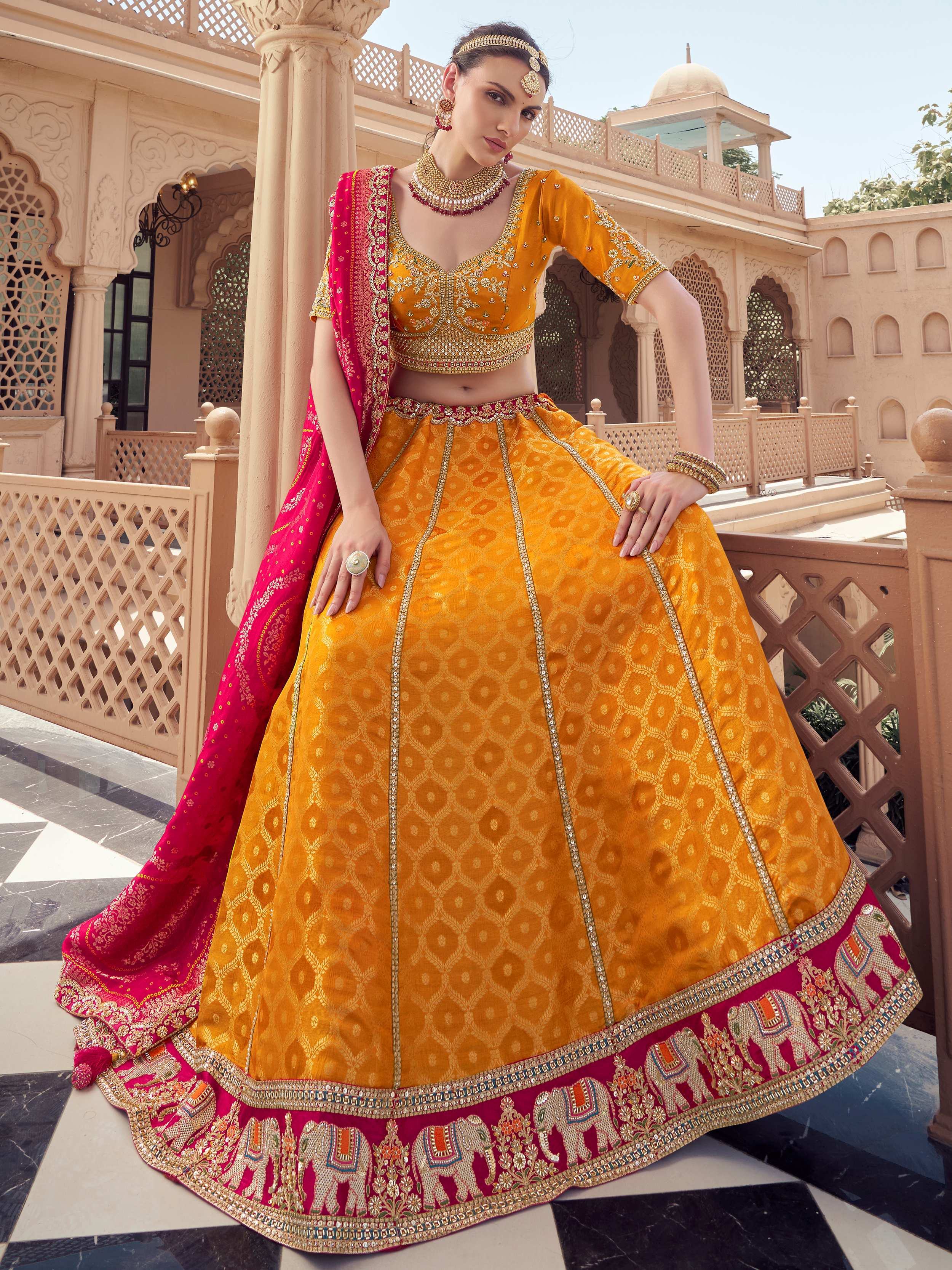 Lovely Mustard Embroidered Tissue Wedding Wear Lehenga Choli
