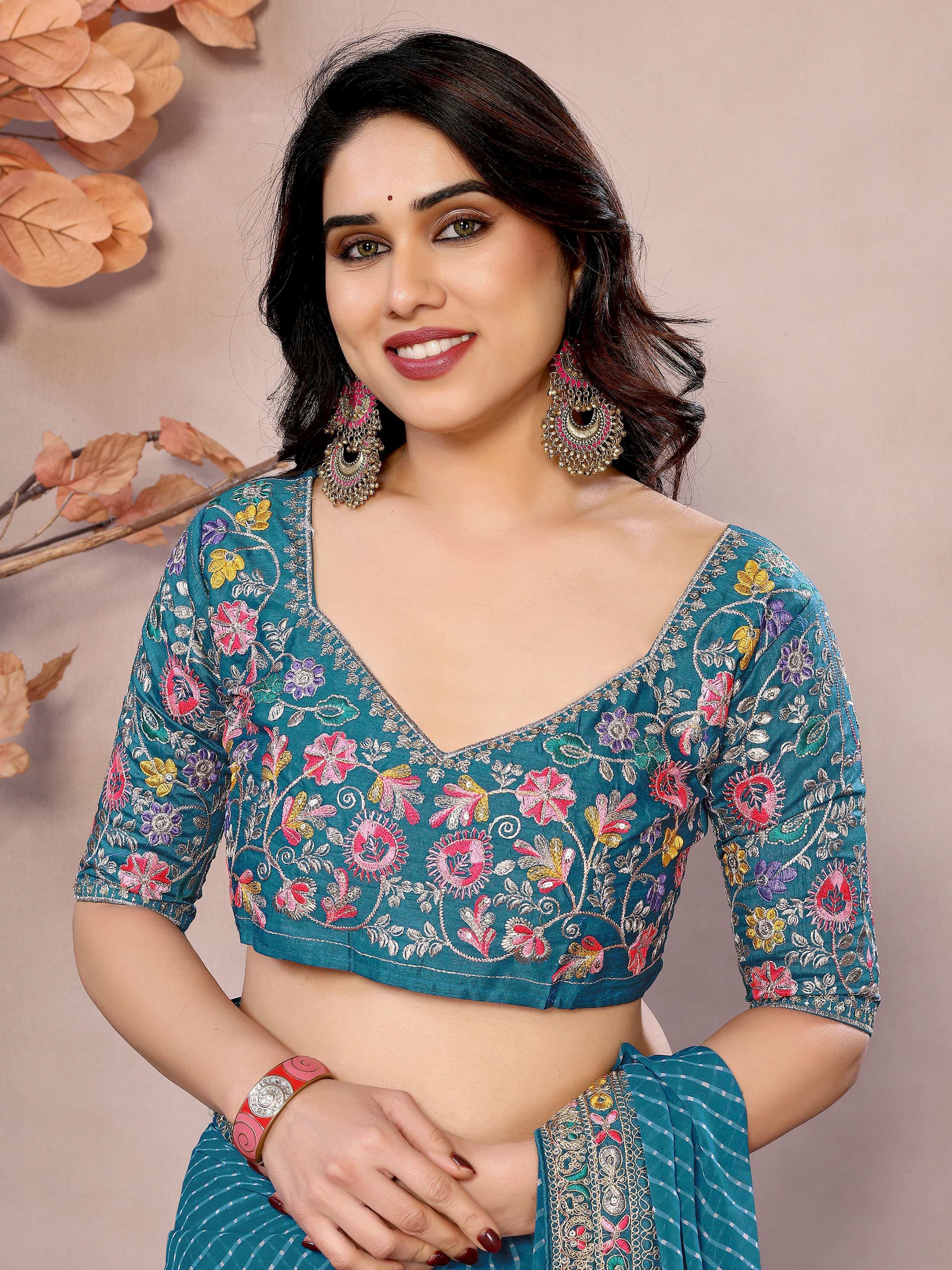 Teal Attractive Georgette Thread Embroidered Saree