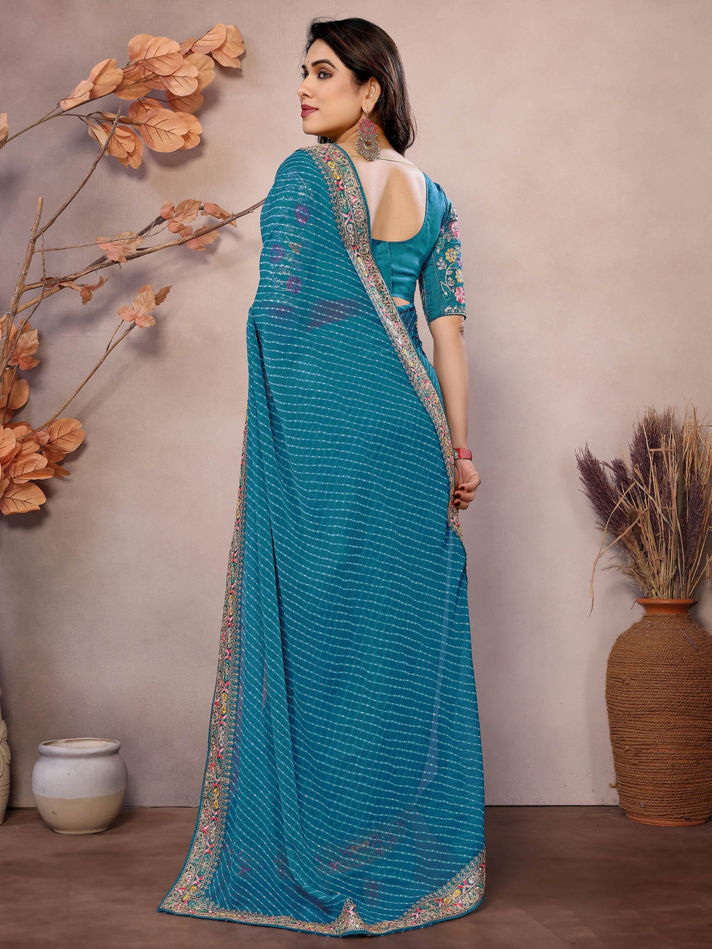 Teal Attractive Georgette Thread Embroidered Saree