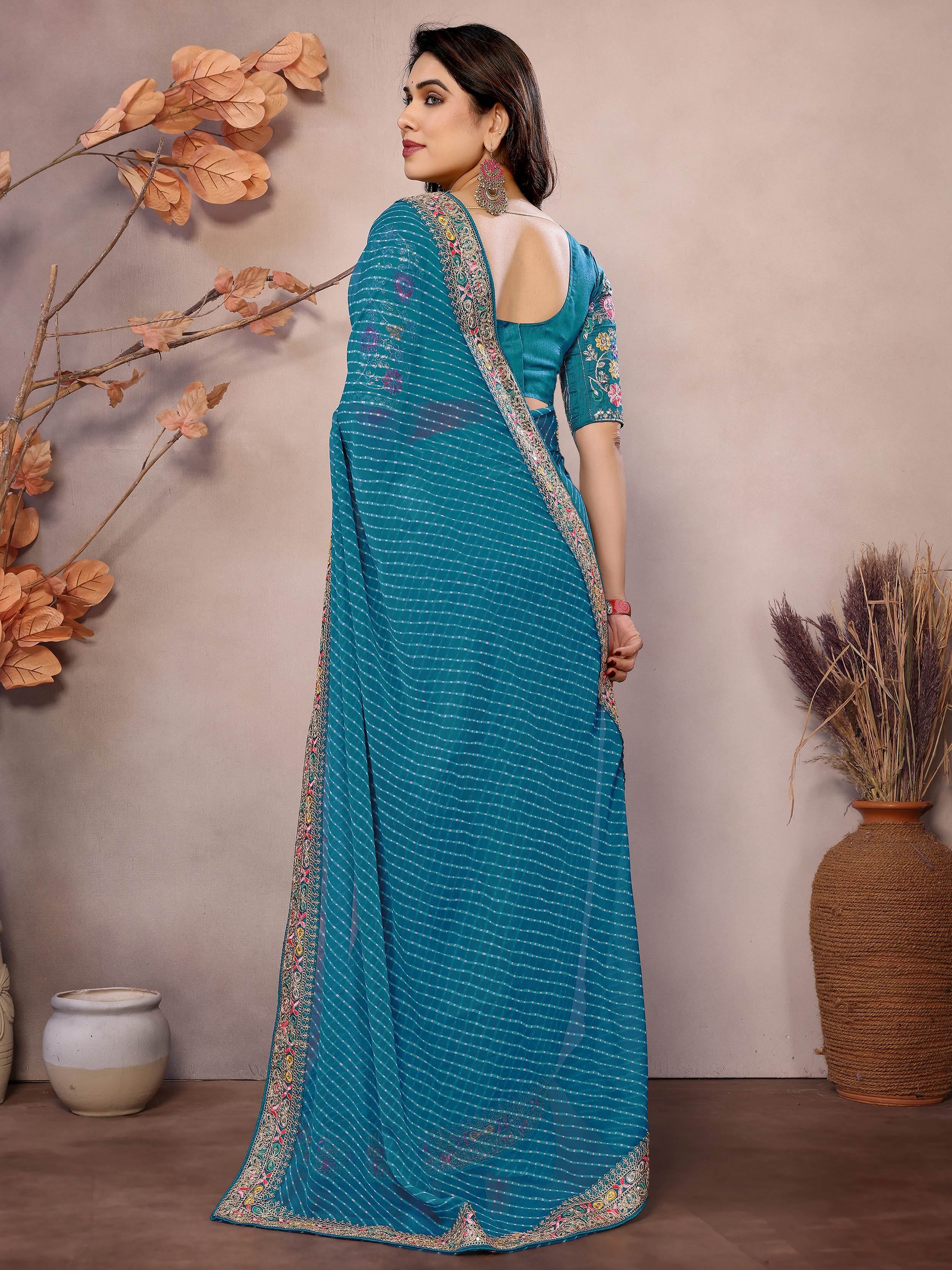 Teal Attractive Georgette Thread Embroidered Saree