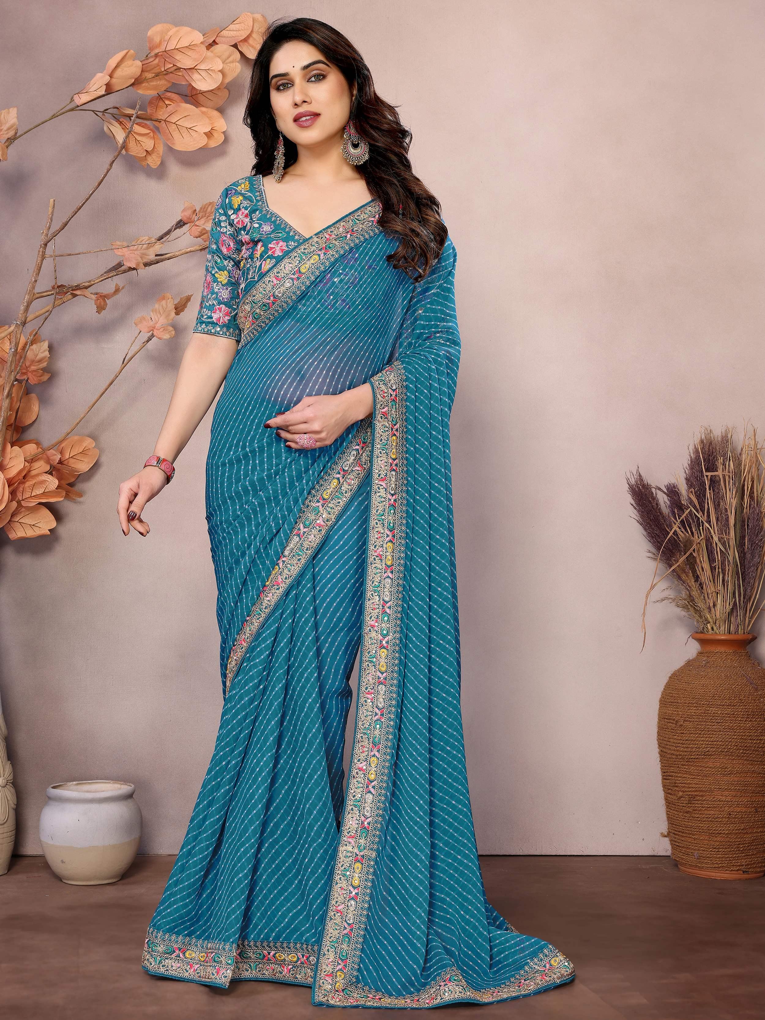 Teal Attractive Georgette Thread Embroidered Saree