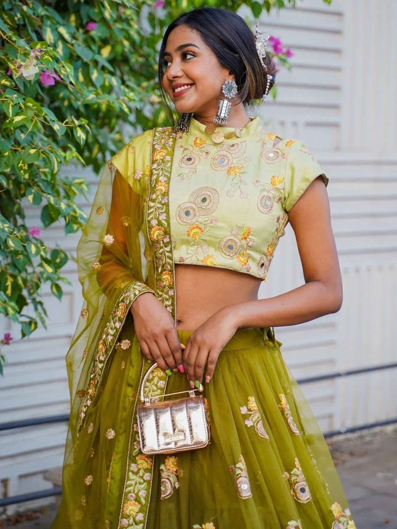 Ravishing Green Mirror Embroidered Net Reception Wear Lehenga Choli