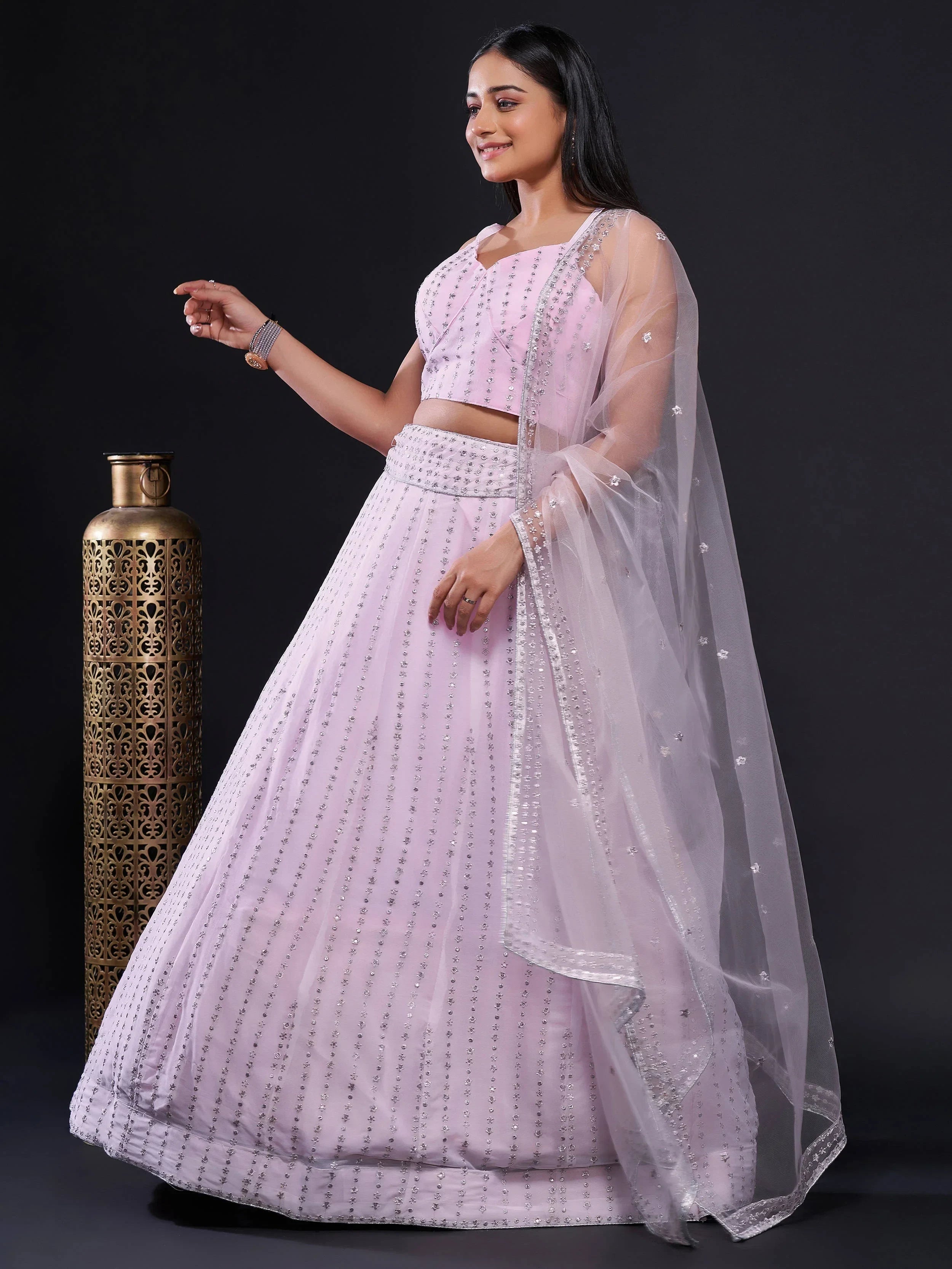 Marvelous Pink Sequins Georgette Reception Wear Lehenga Choli