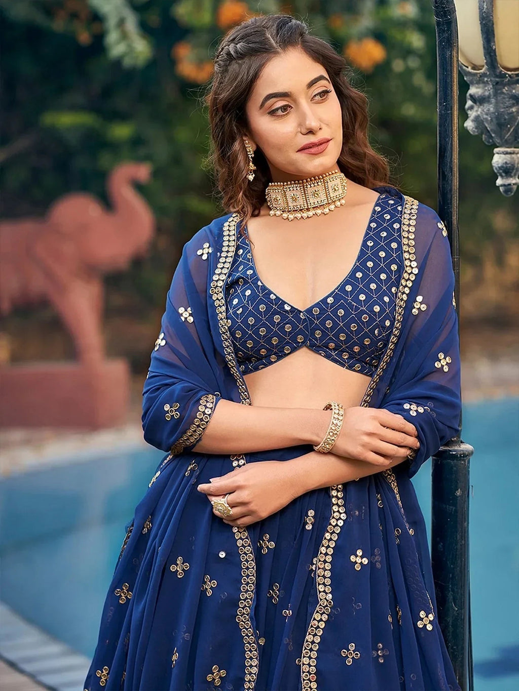 Enchanting Navy Blue Georgette Sequins Embroidered Lehenga Choli