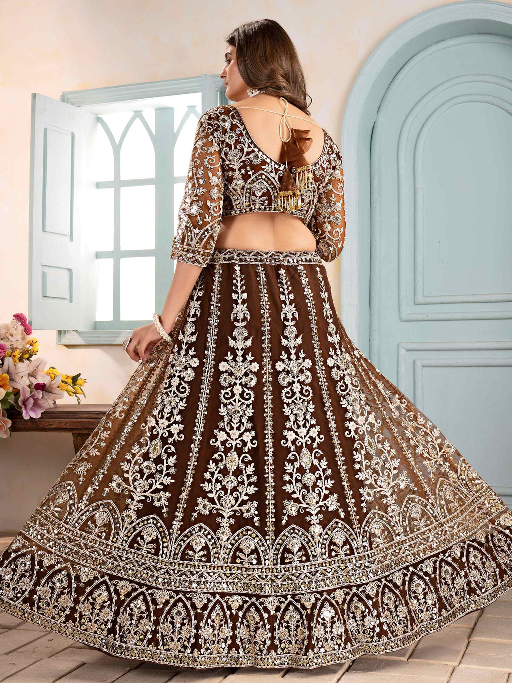 Brown Captivating Net Sequins Embroidered Bridesmaid Lehenga Choli