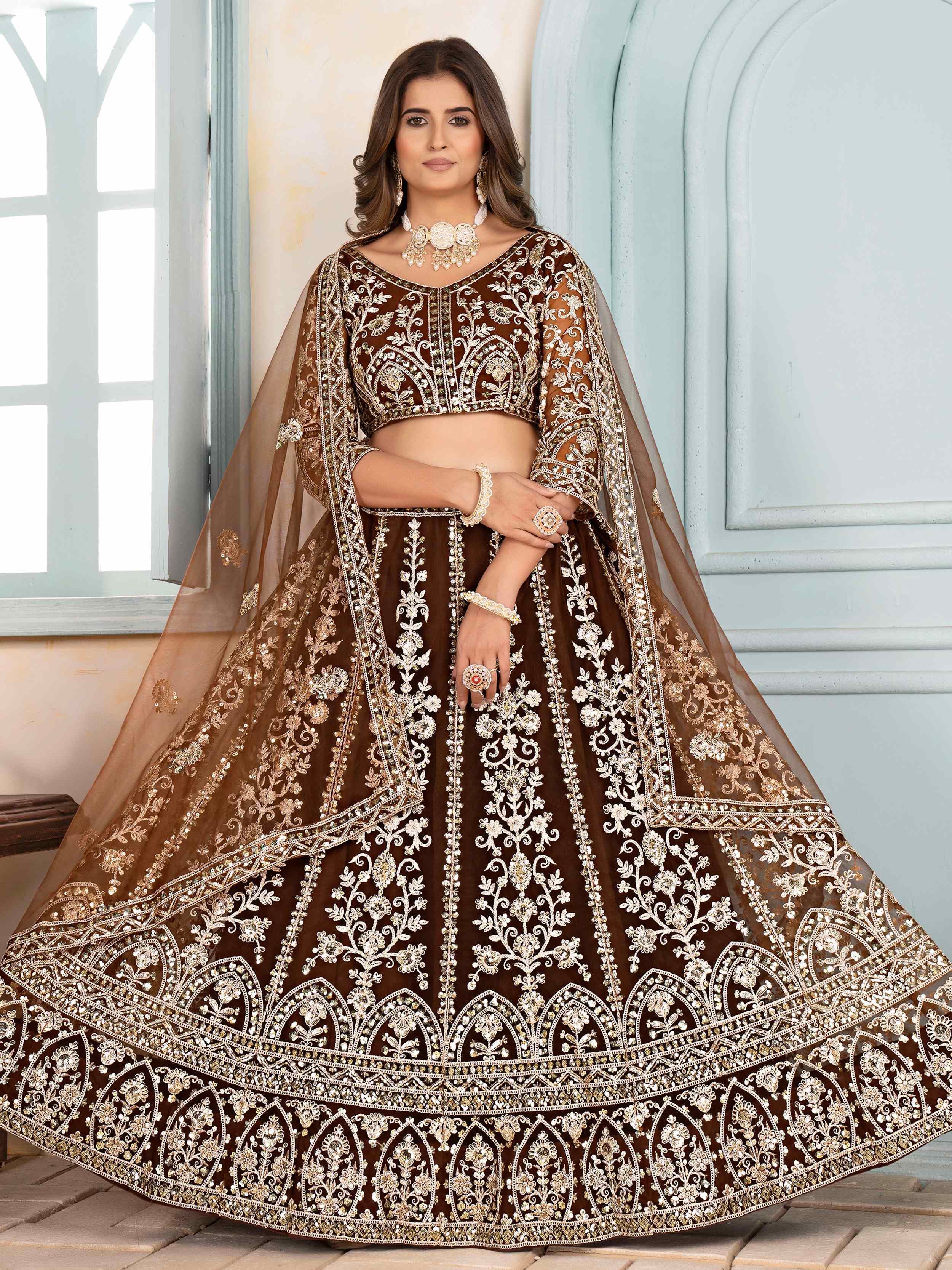 Brown Captivating Net Sequins Embroidered Bridesmaid Lehenga Choli