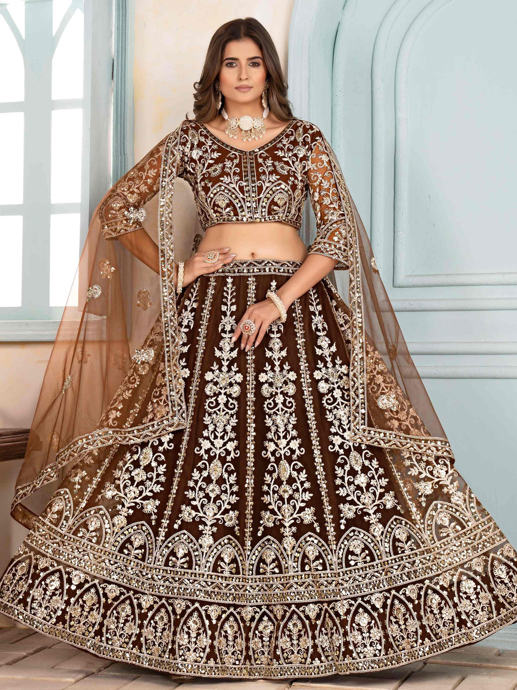 Brown Captivating Net Sequins Embroidered Bridesmaid Lehenga Choli