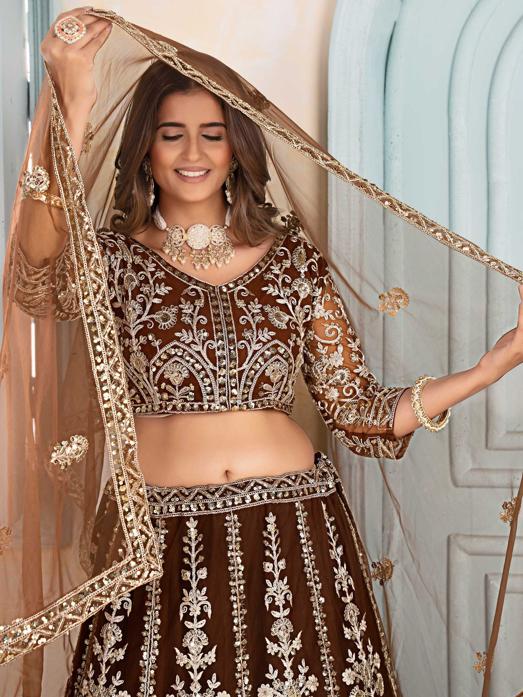 Brown Captivating Net Sequins Embroidered Bridesmaid Lehenga Choli