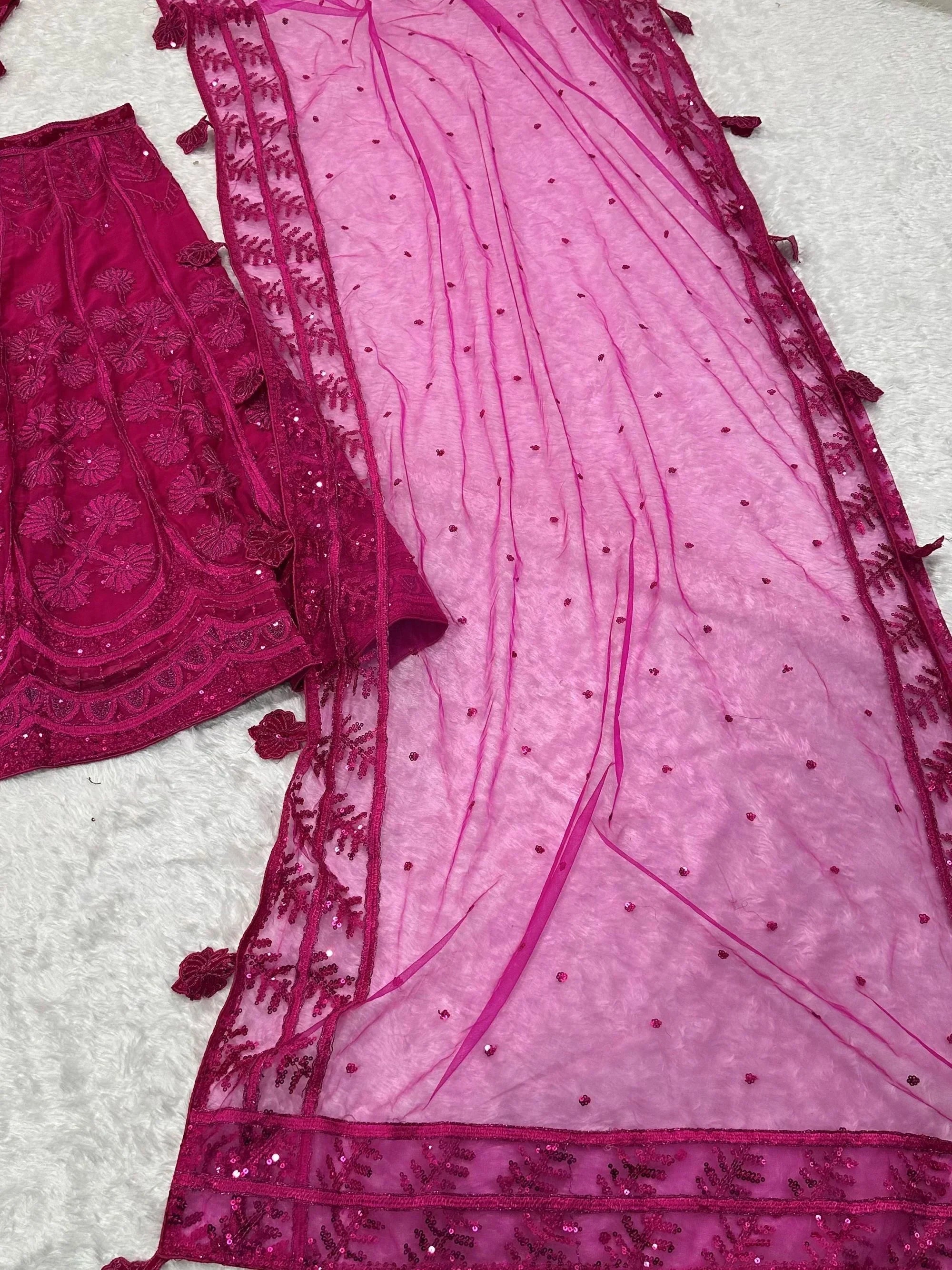 Graceful Pink Sequins Embroidered Silk Wedding Wear Lehenga Choli