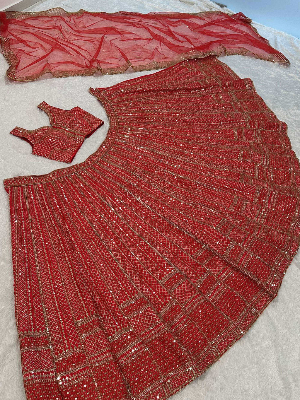 Lavishing Red Thread Embroidered Satin Wedding Wear Lehenga Choli