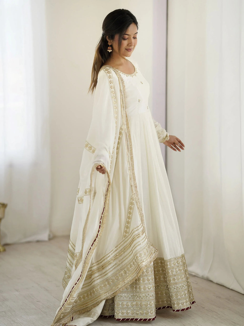 White Outstanding Silk Sequins Embroidered Anarkali Suit